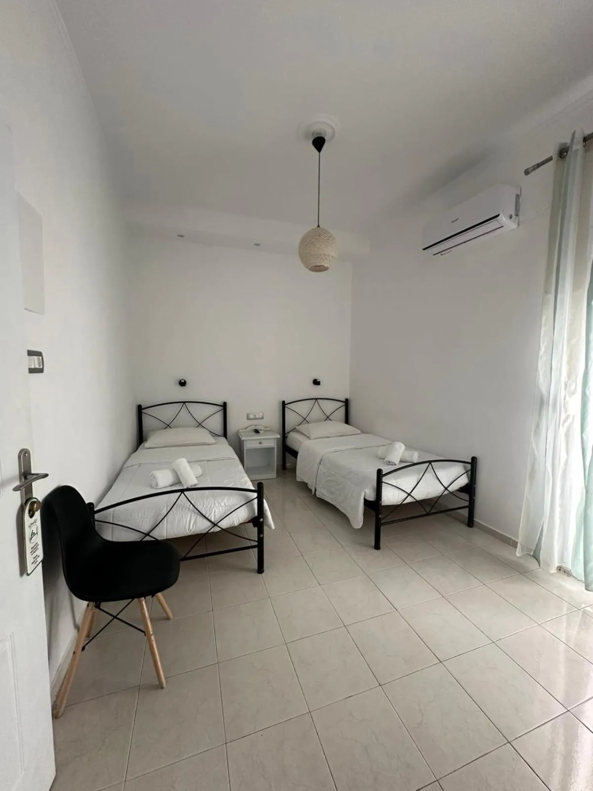 Bed in Hotel Thirasia