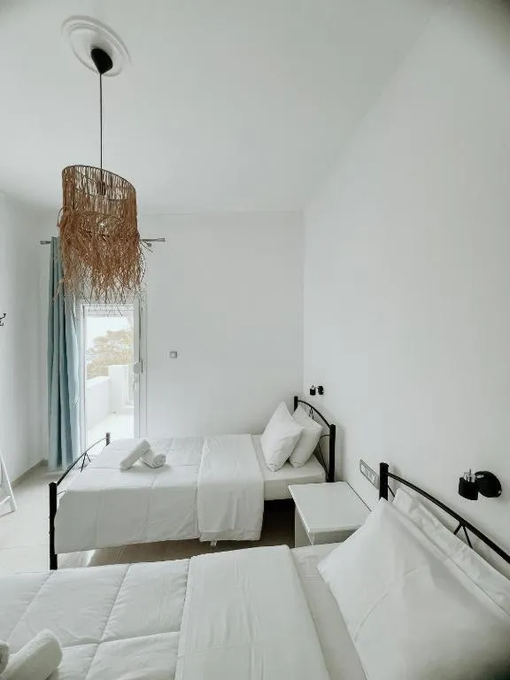 Bed in Hotel Thirasia