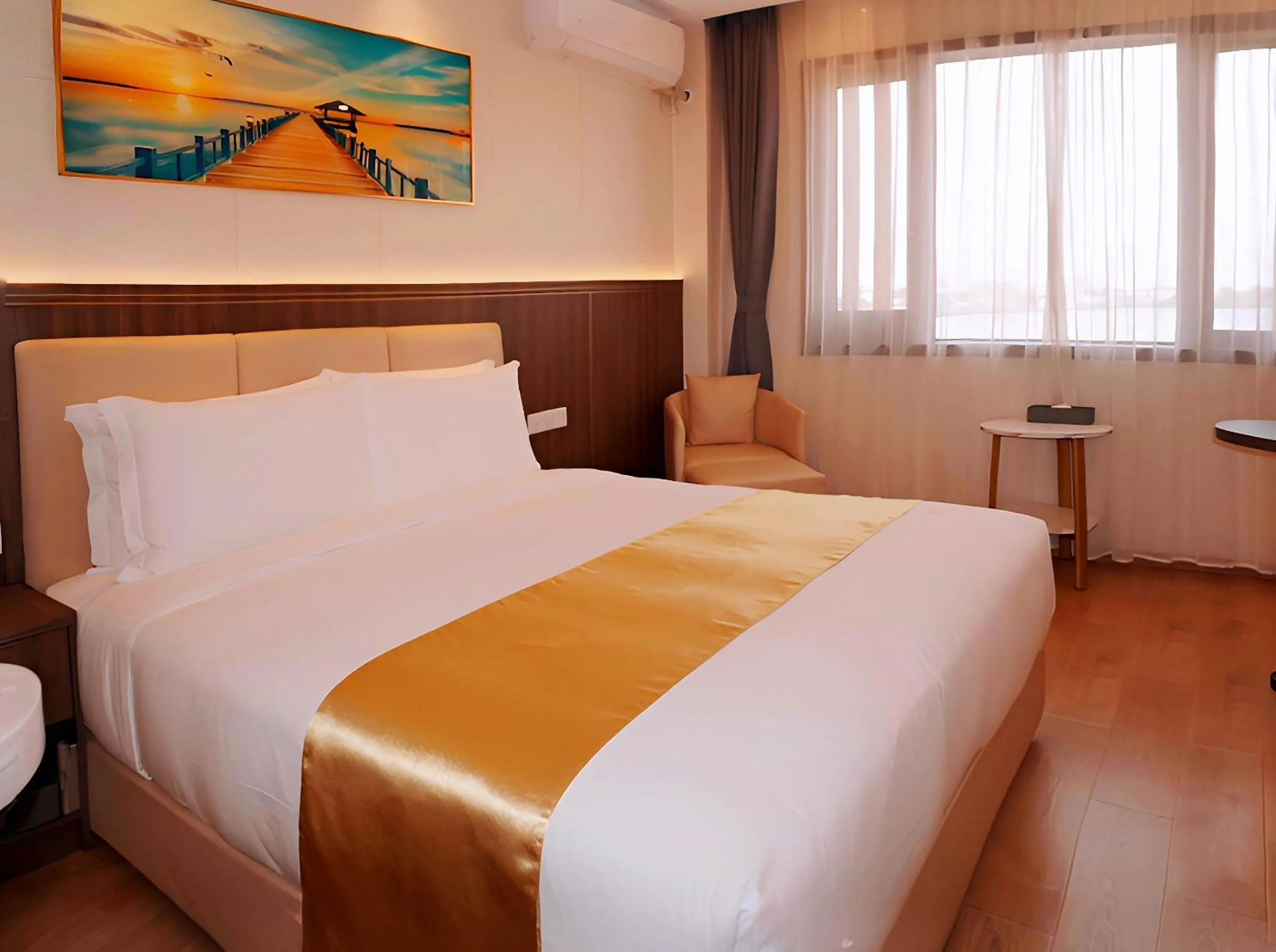 Bed in Escale International Hotel