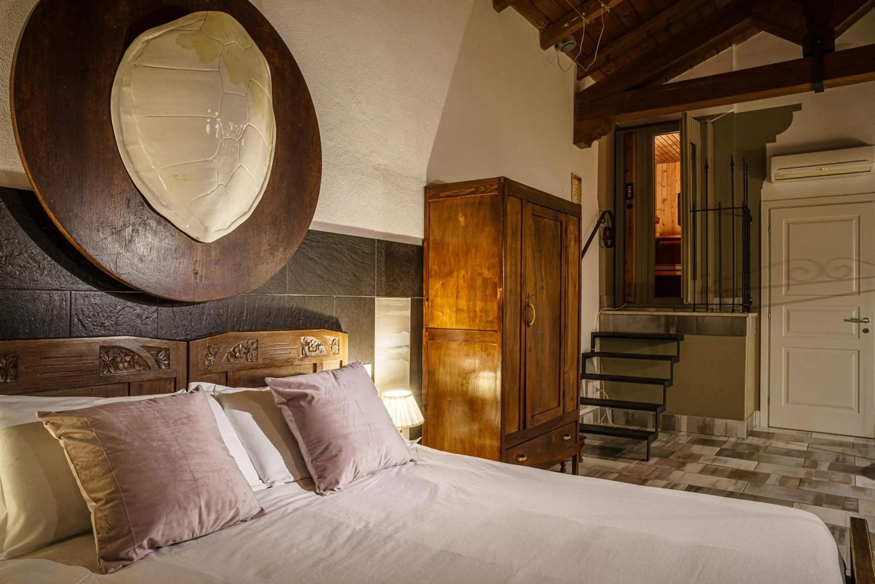 Photo of the whole room, Bed in Le Meraviglie di Alice