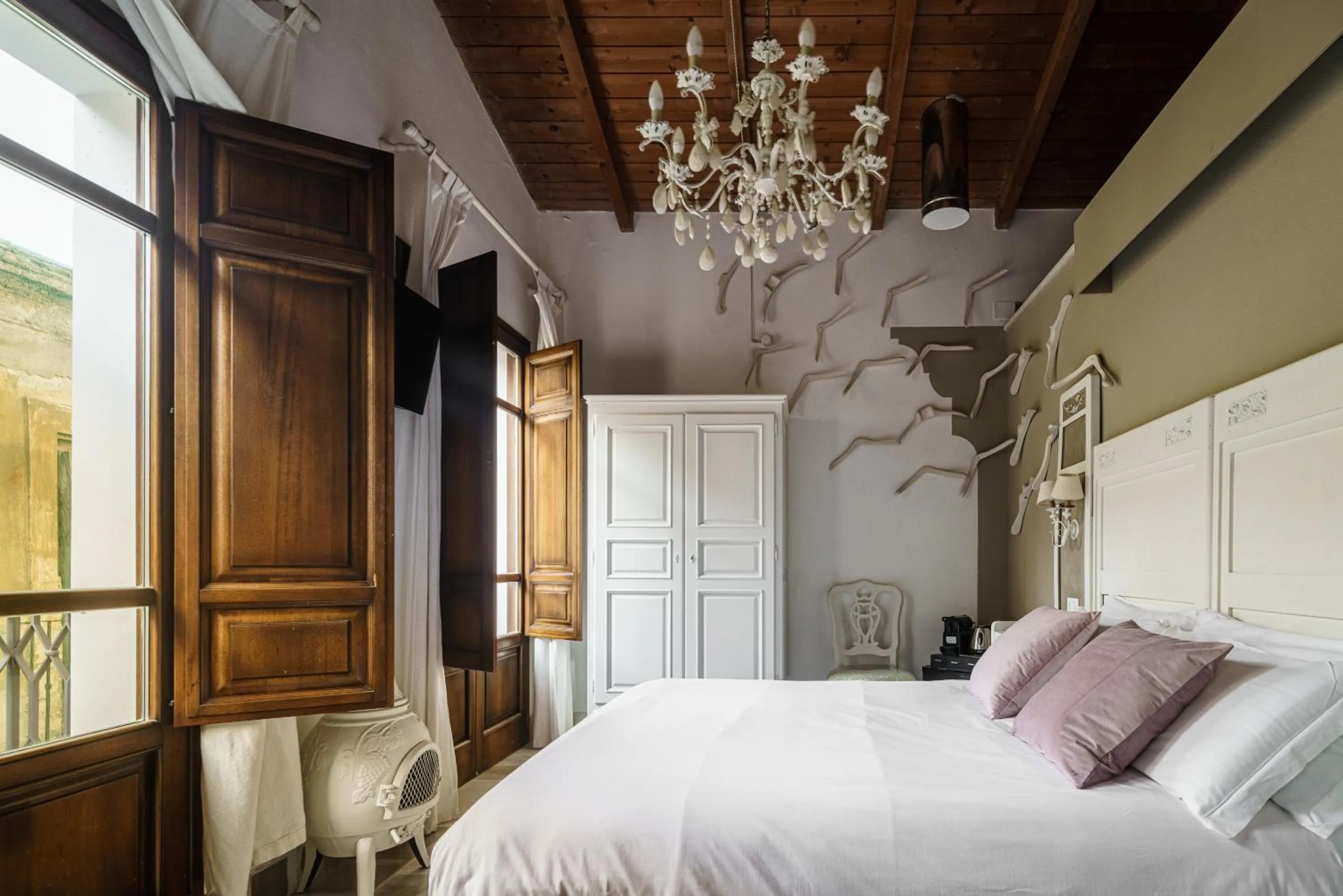 Photo of the whole room, Bed in Le Meraviglie di Alice