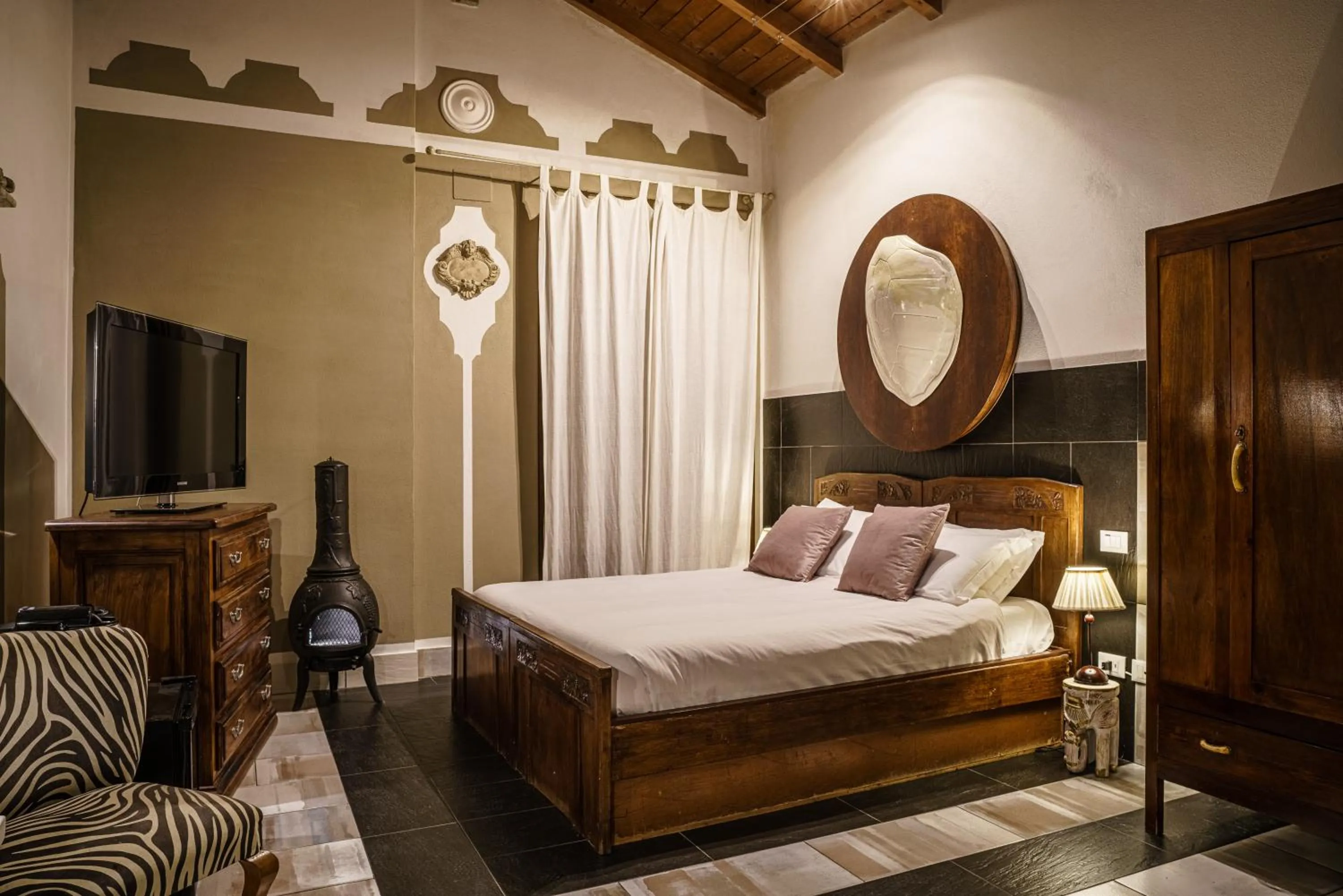Photo of the whole room, Bed in Le Meraviglie di Alice