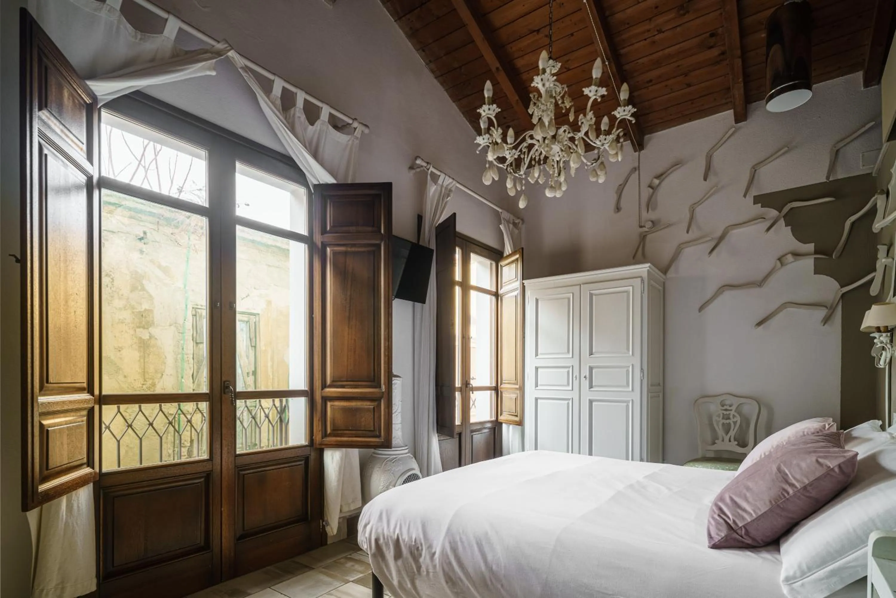 Photo of the whole room, Bed in Le Meraviglie di Alice
