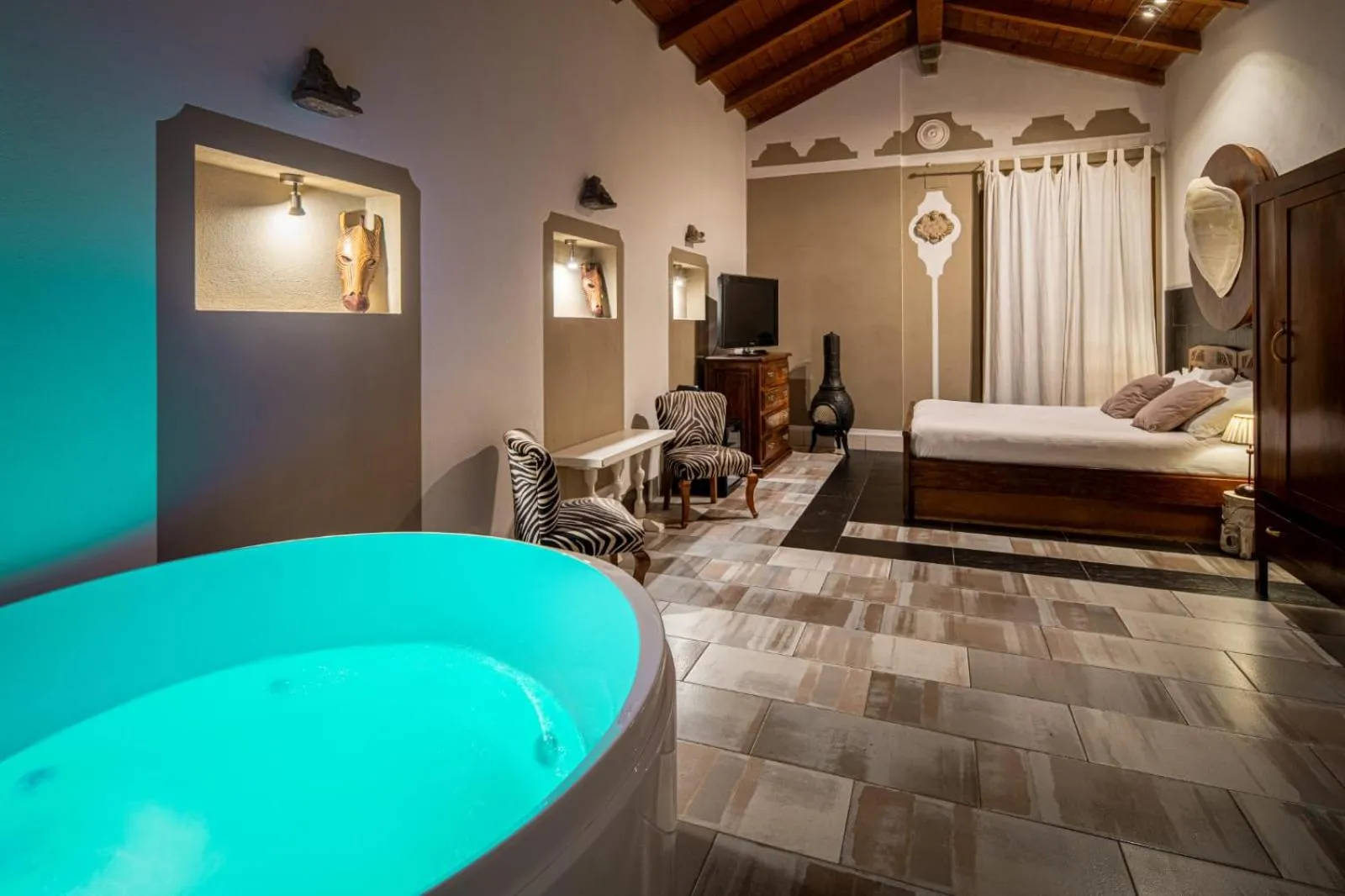 Photo of the whole room, Bed in Le Meraviglie di Alice