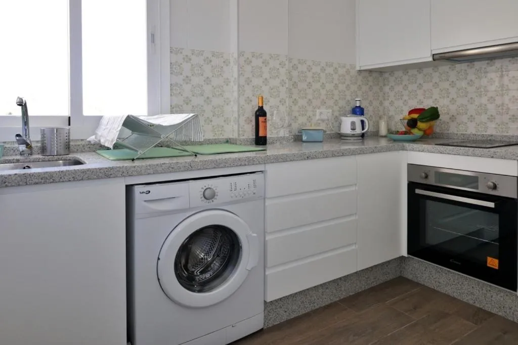 Kitchen or kitchenette in Sea Front Apartment in La Cala de Mijas