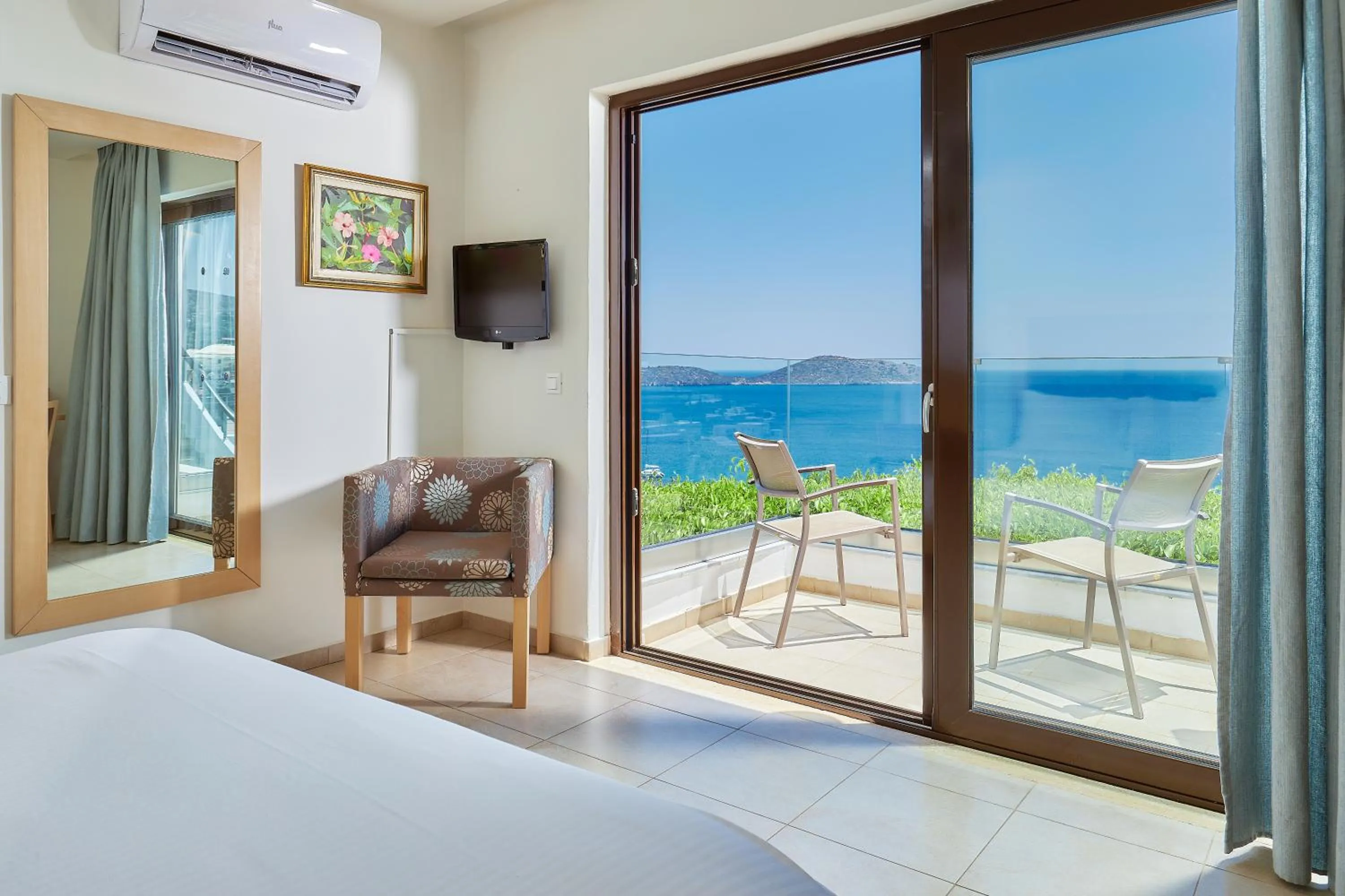 Balcony/Terrace, Bed in Elounda Ilion Hotel Bungalows