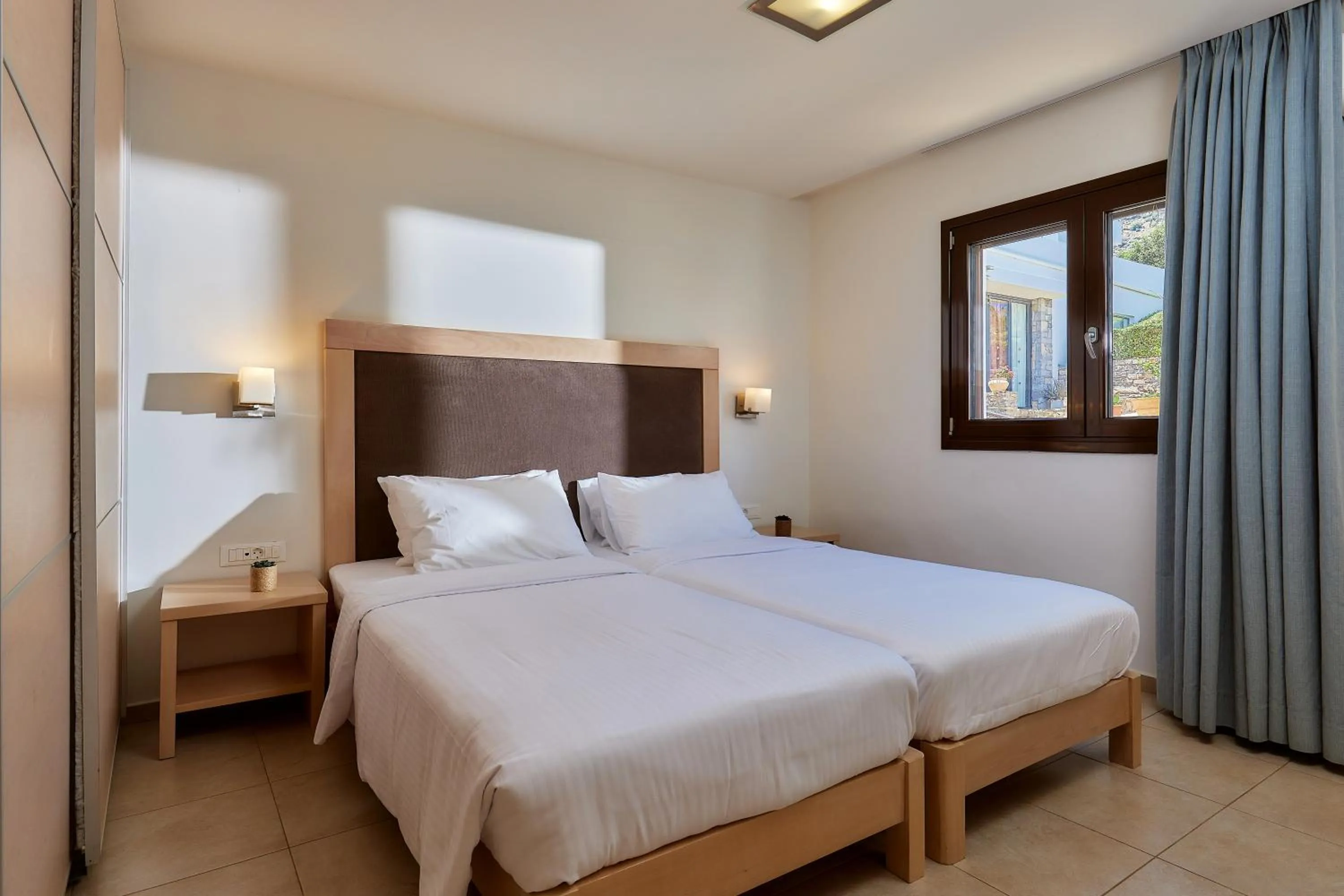Bedroom, Bed in Elounda Ilion Hotel Bungalows