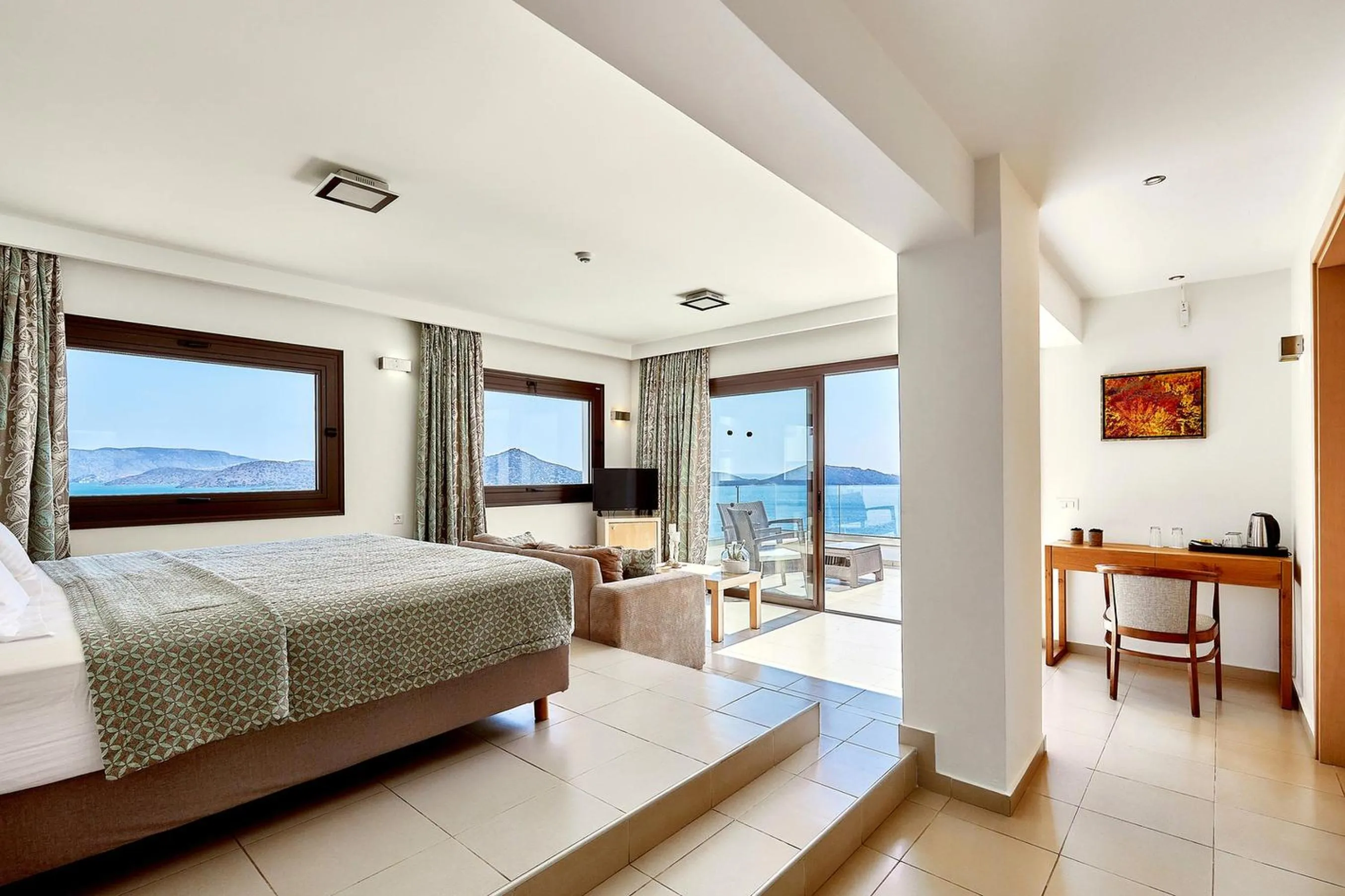Photo of the whole room, Bed in Elounda Ilion Hotel Bungalows