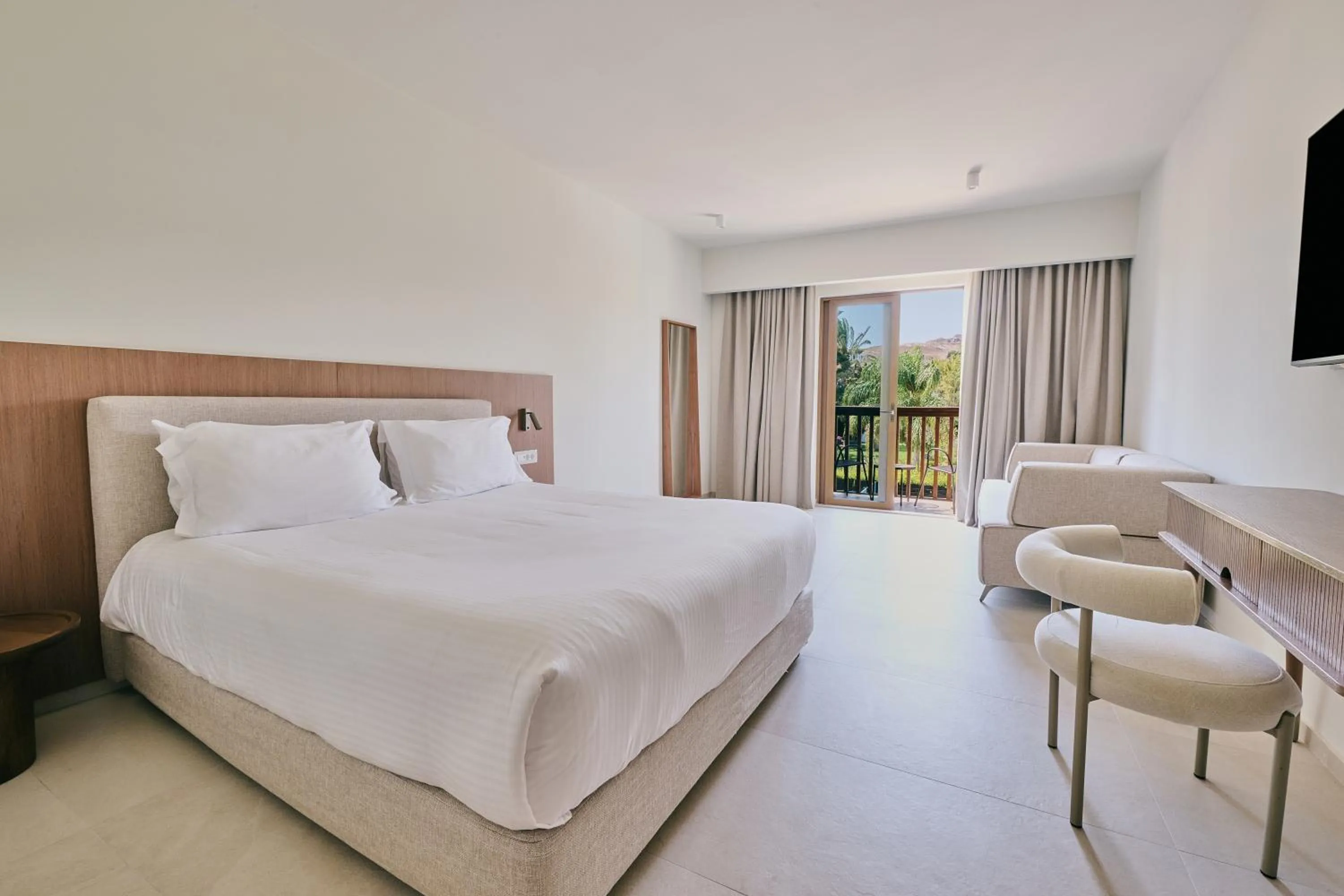 Bed in Oceanis Beach & Spa Resort