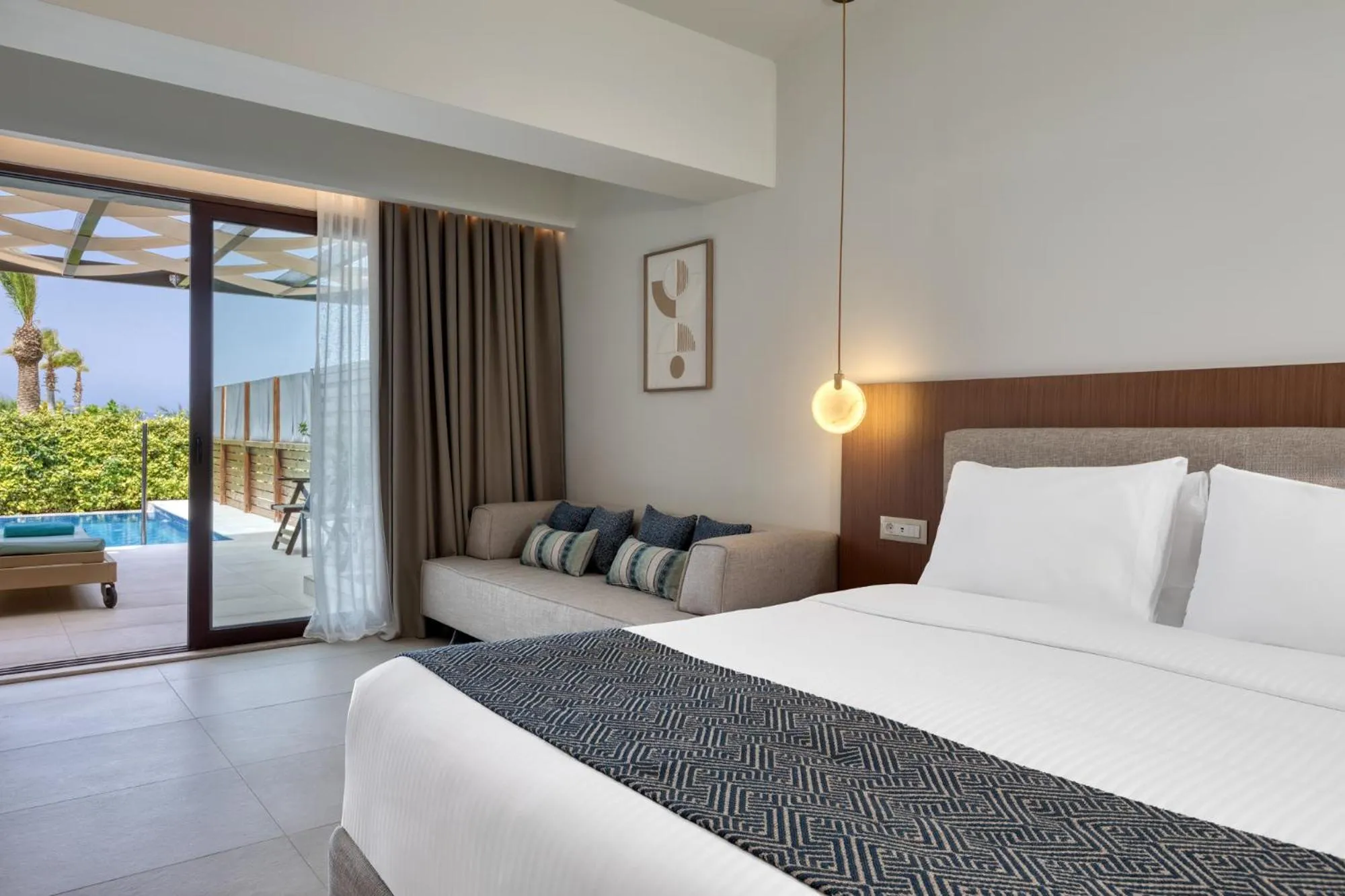 Bed in Oceanis Beach & Spa Resort