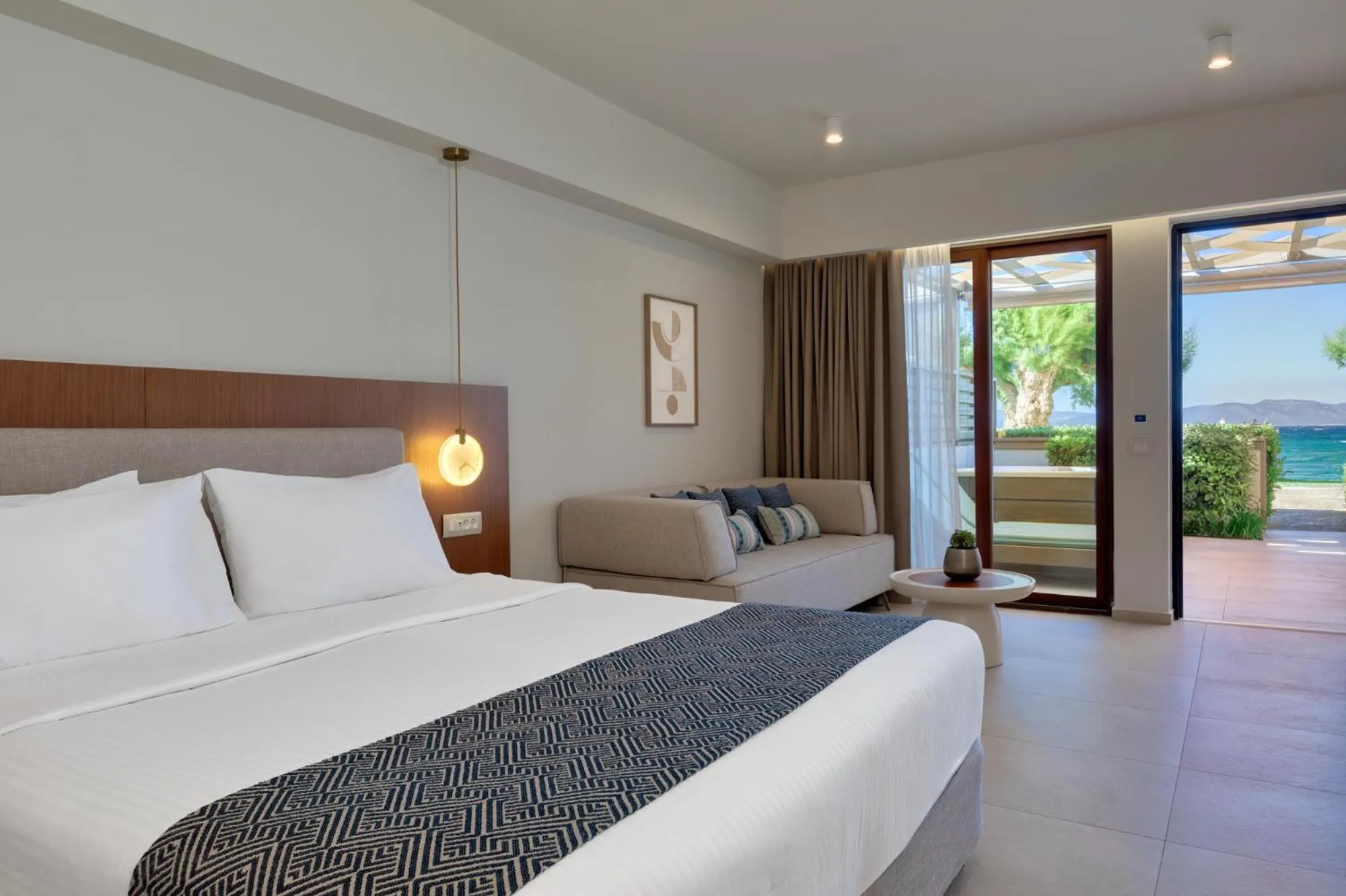 Bed in Oceanis Beach & Spa Resort