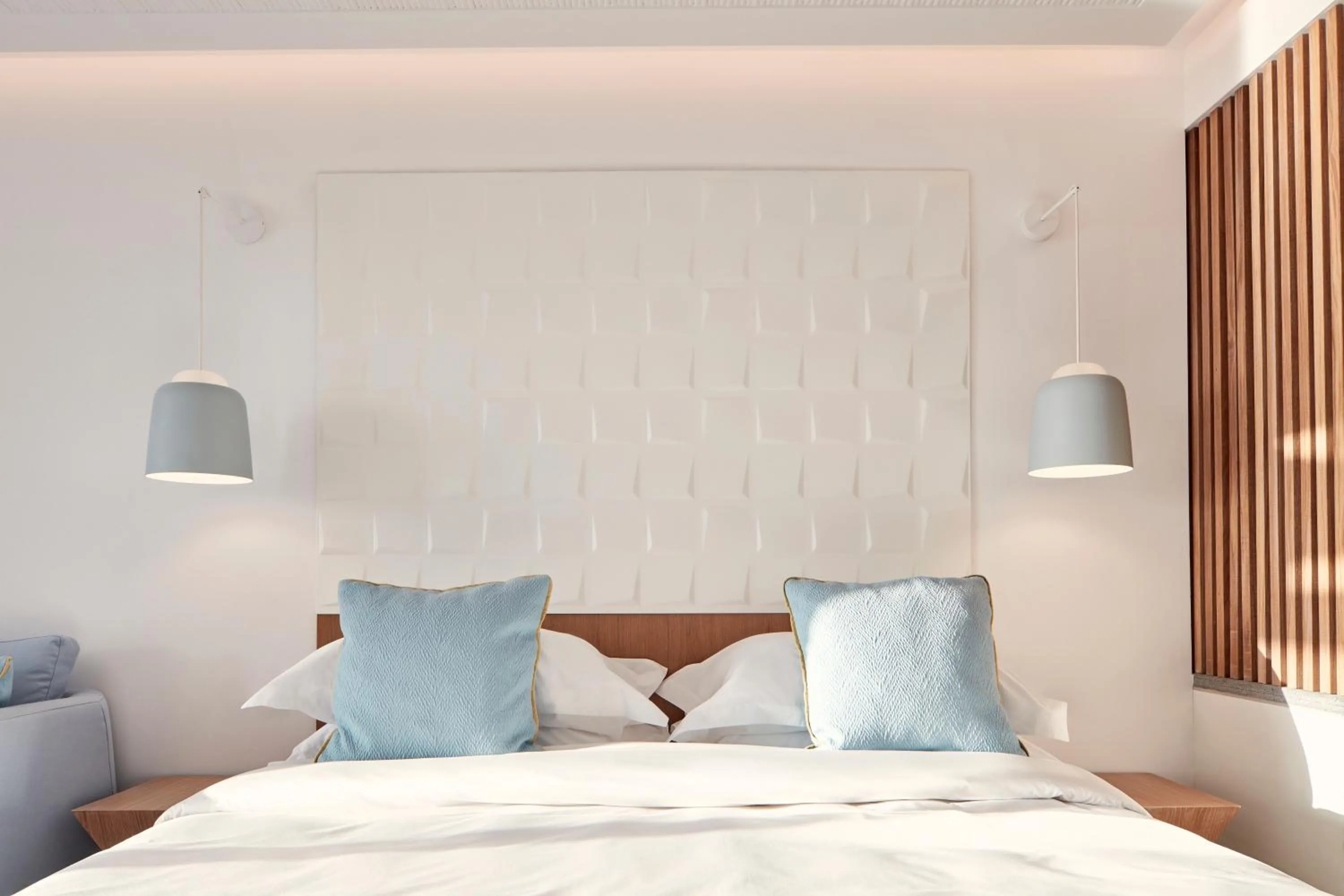 Bedroom in Myconian Korali Relais & Chateaux