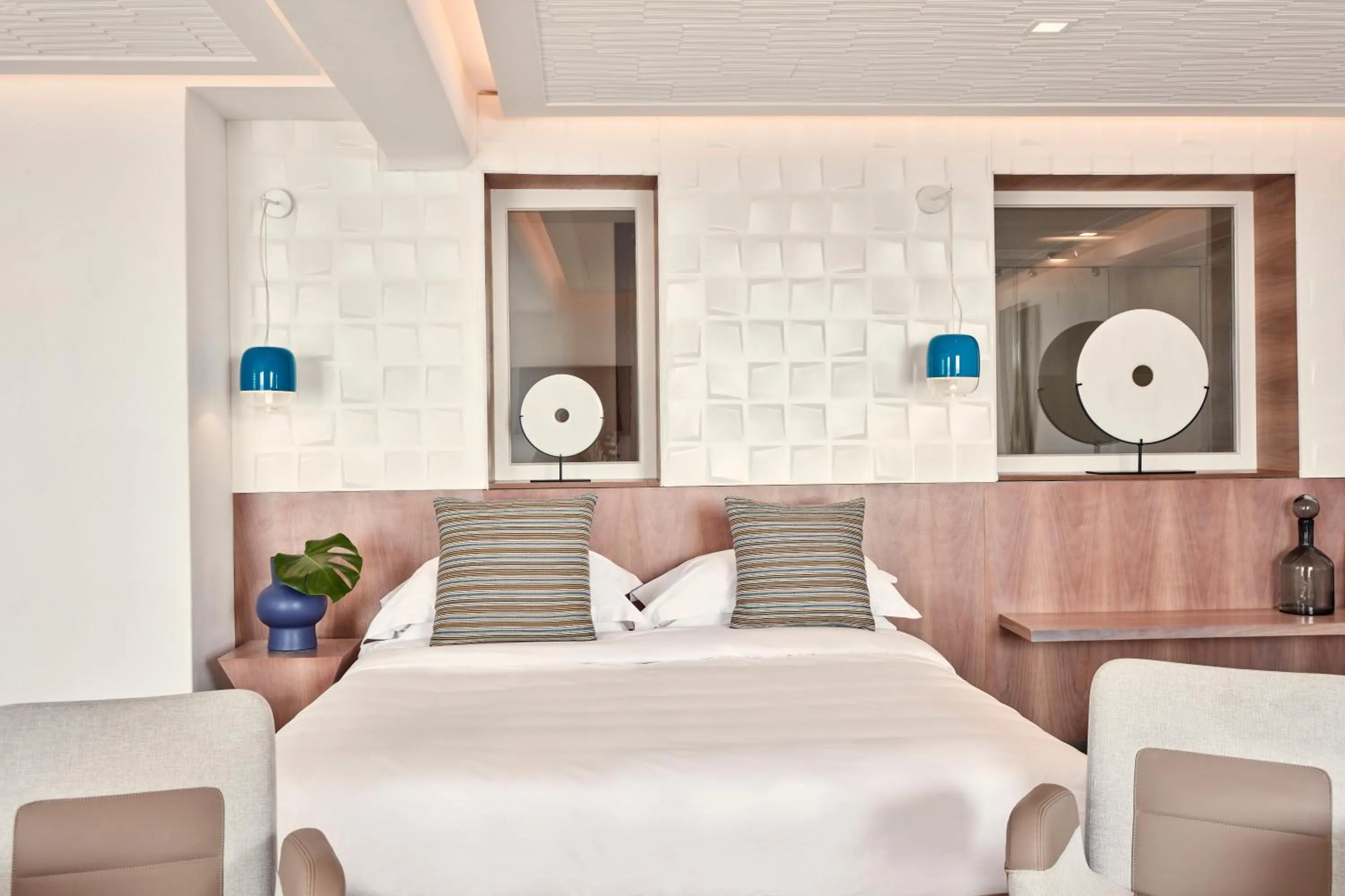 Bedroom in Myconian Korali Relais & Chateaux