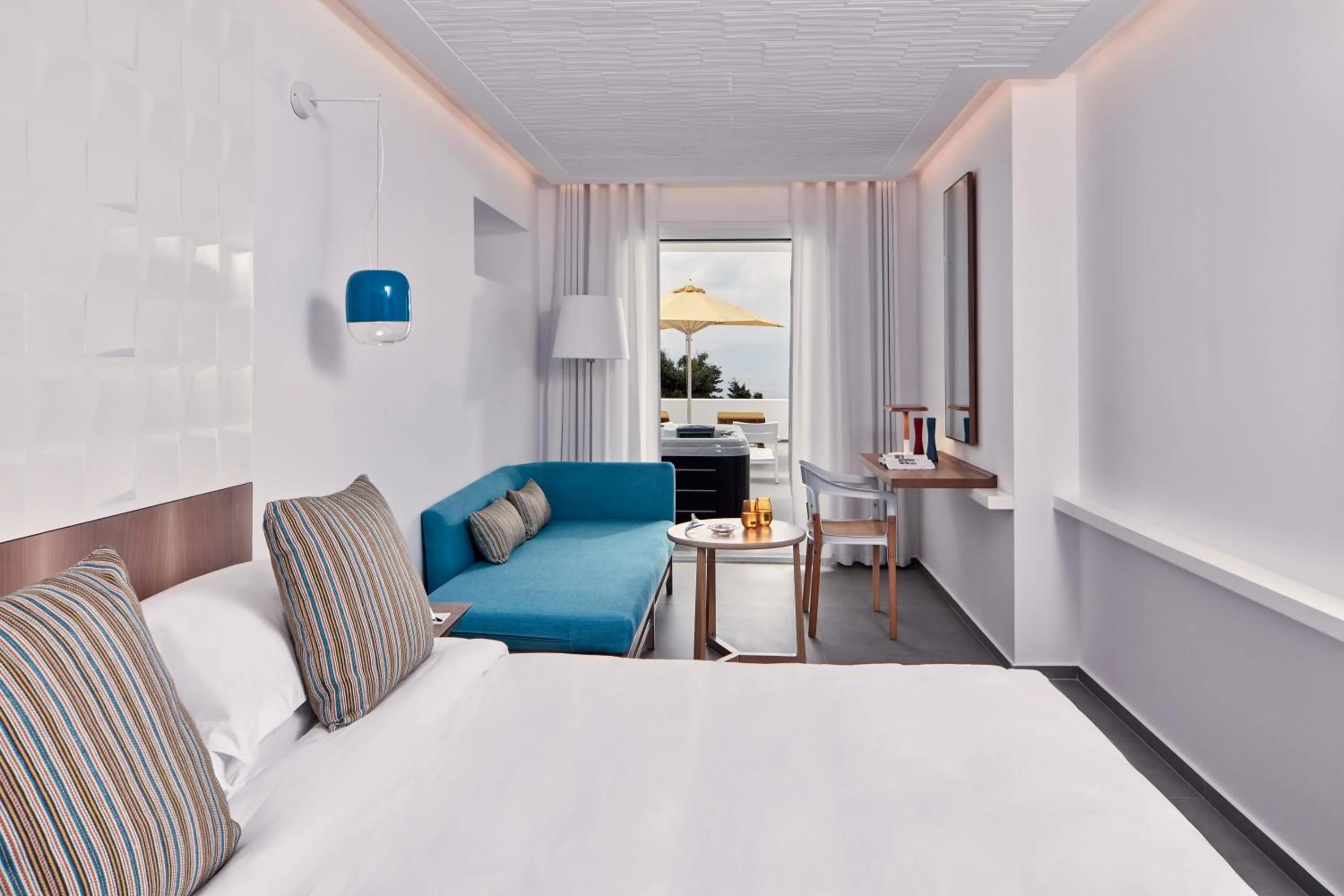 Bedroom in Myconian Korali Relais & Chateaux