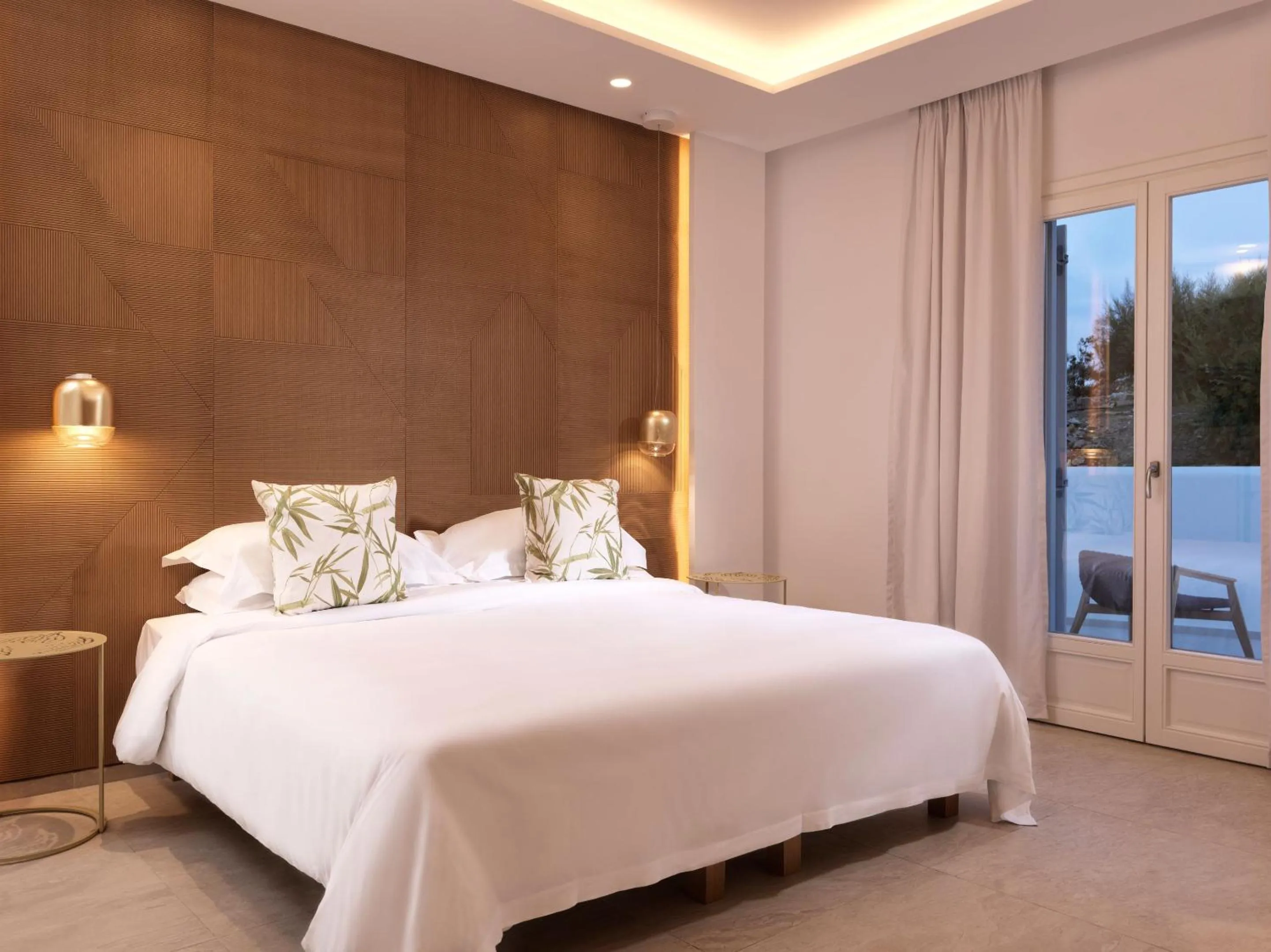 Bedroom in Myconian Korali Relais & Chateaux