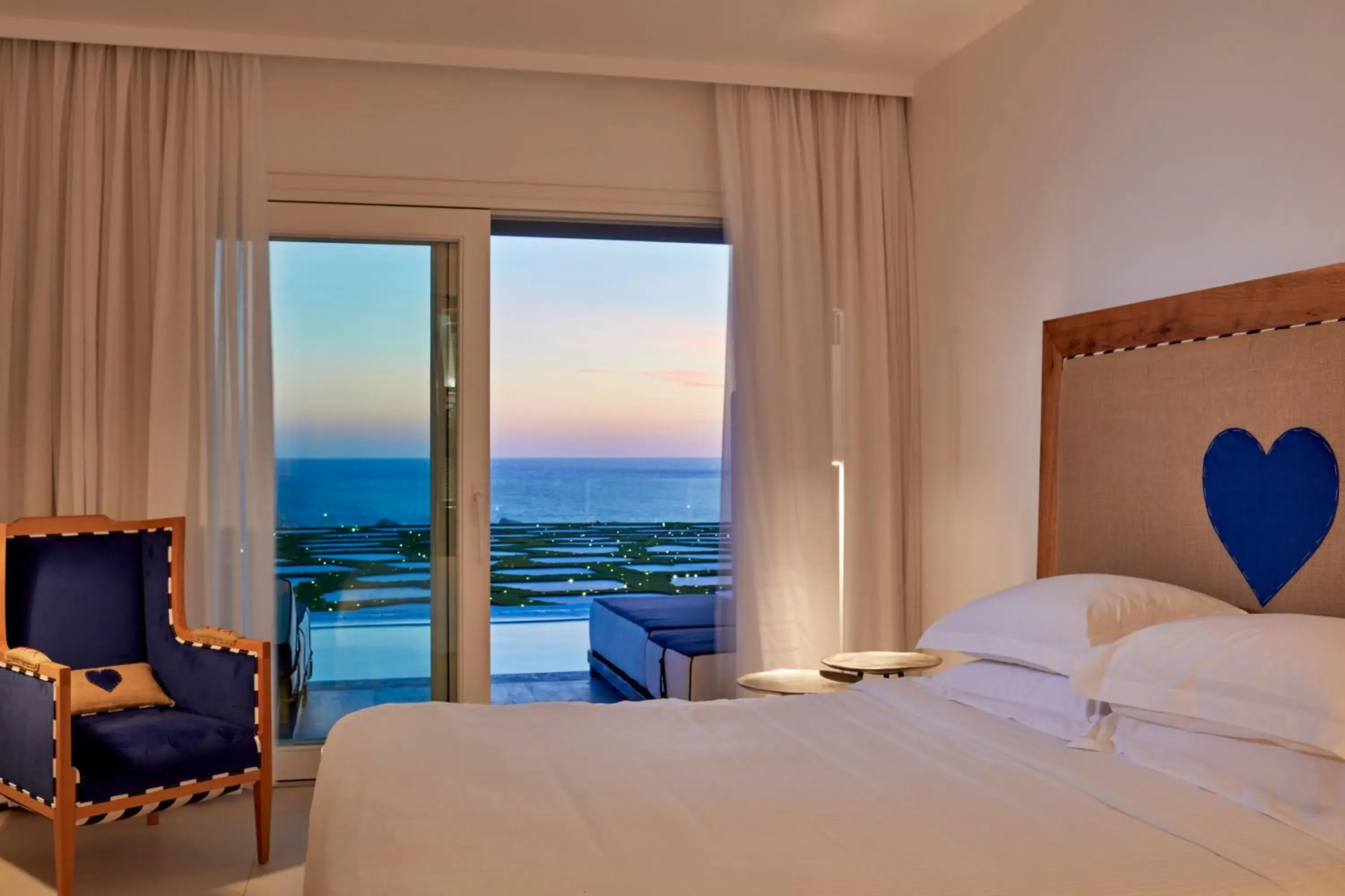 Bed in Myconian Imperial - Leading Hotels of the World Bed in Myconian Imperial - Leading Hotels of the World