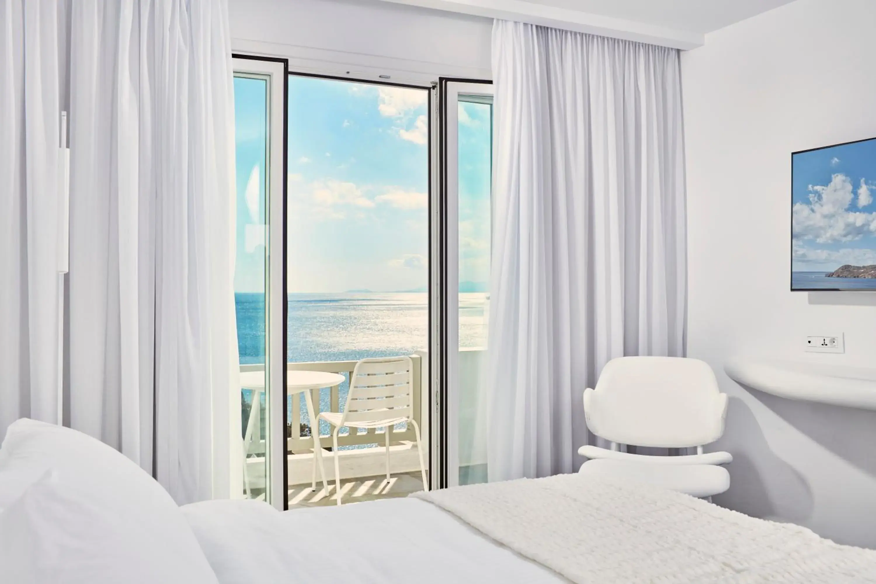 Photo of the whole room, Bed in Royal Myconian - Leading Hotels of the World Photo of the whole room, Bed in Royal Myconian - Leading Hotels of the World