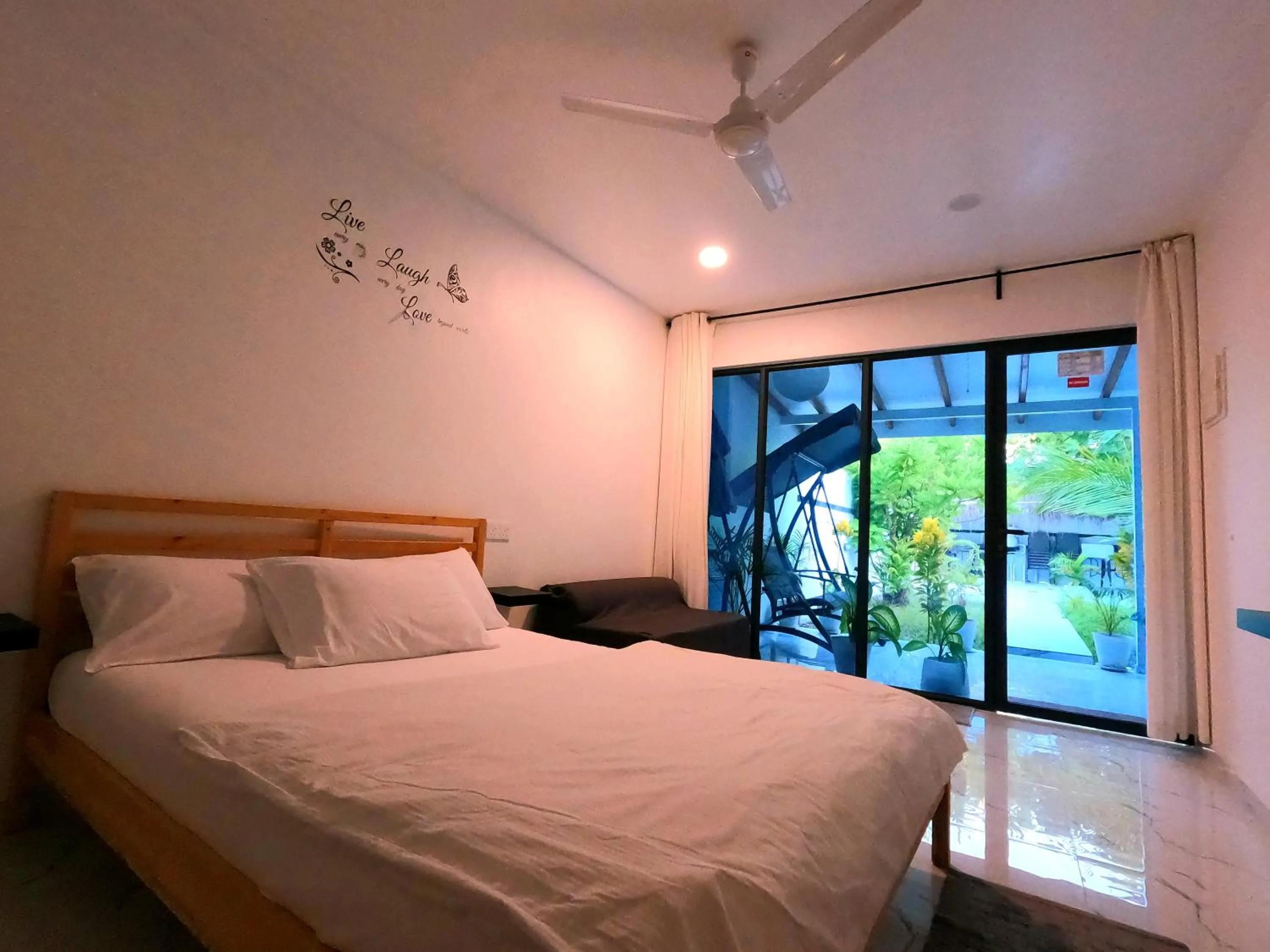Bedroom, Bed in Oceana Inn Maldives - Snorkeling, Sandbank & Surfing Adventures in Kudahuvadhoo Island