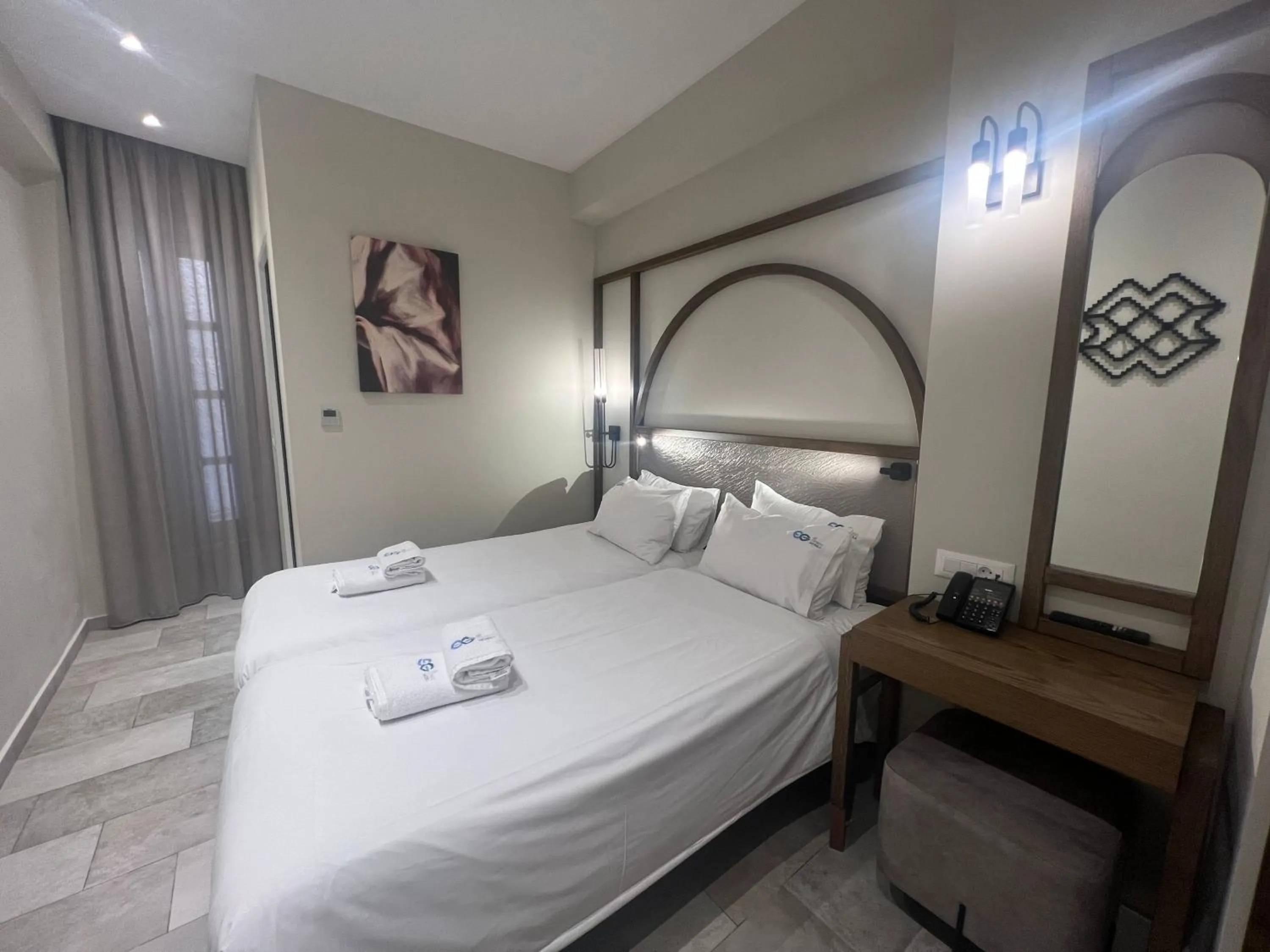 Bed in El Greco Hotel