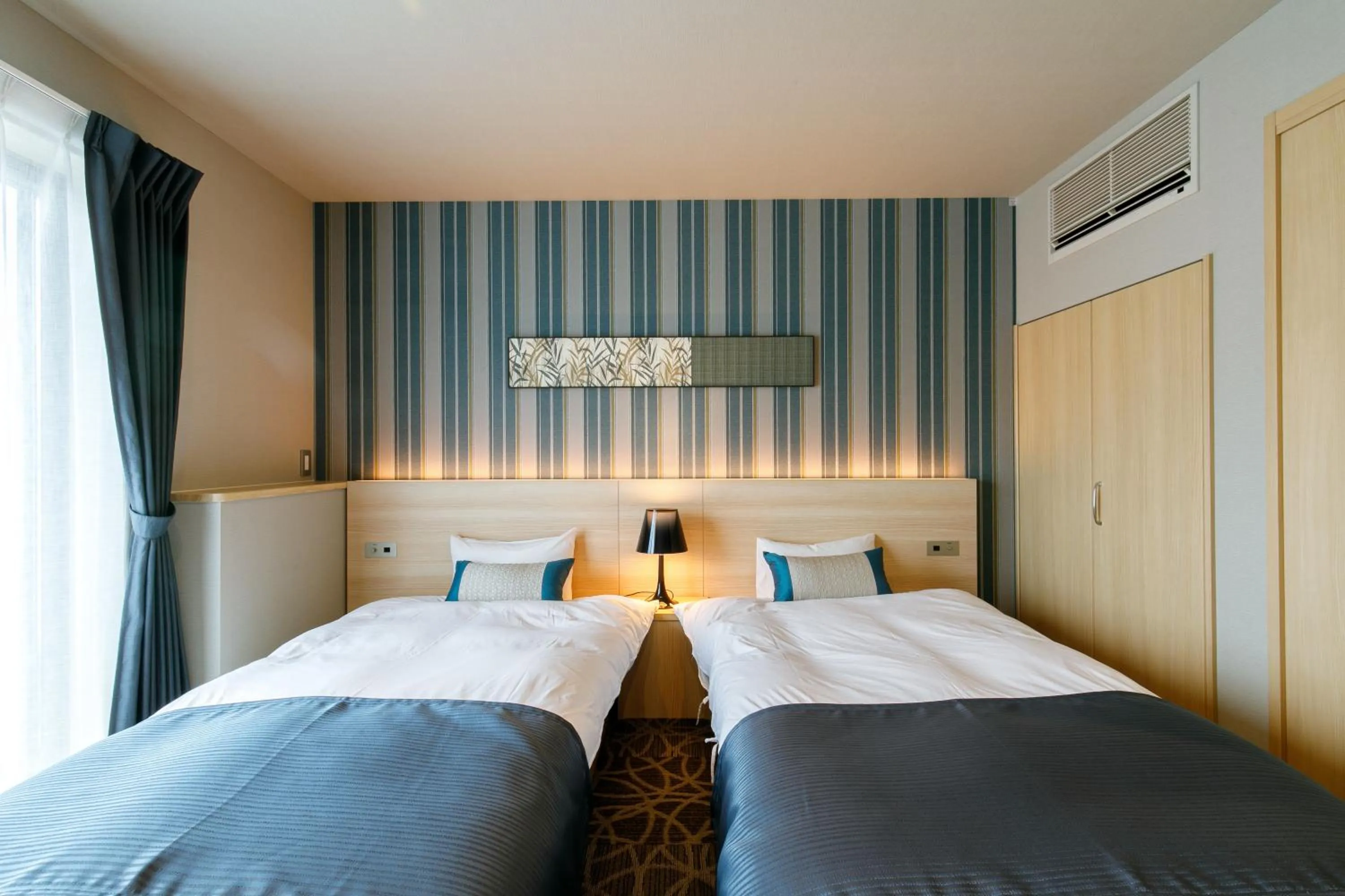 Bed in Oyado Shinmachi Gojo