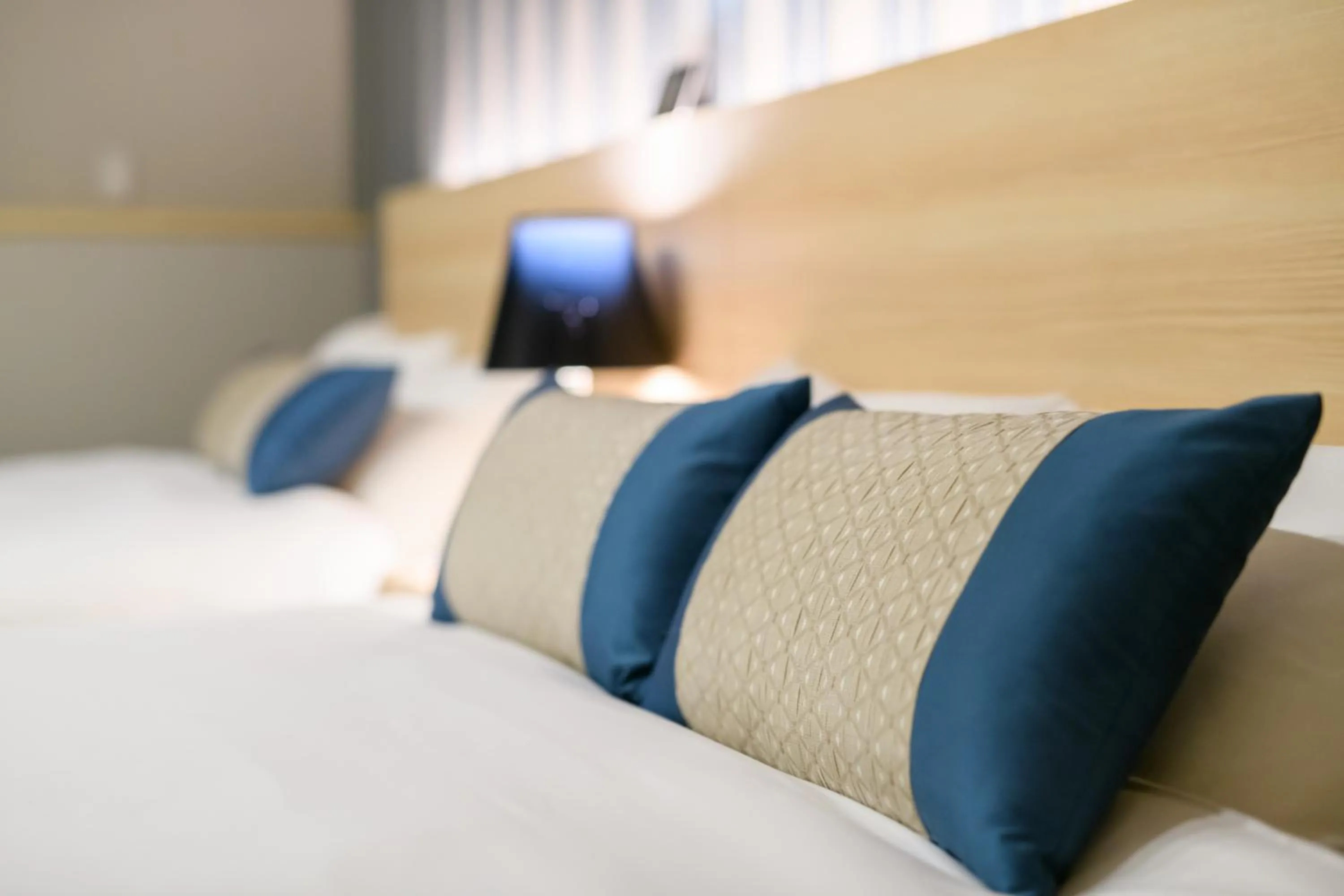 Bed in Oyado Shinmachi Gojo