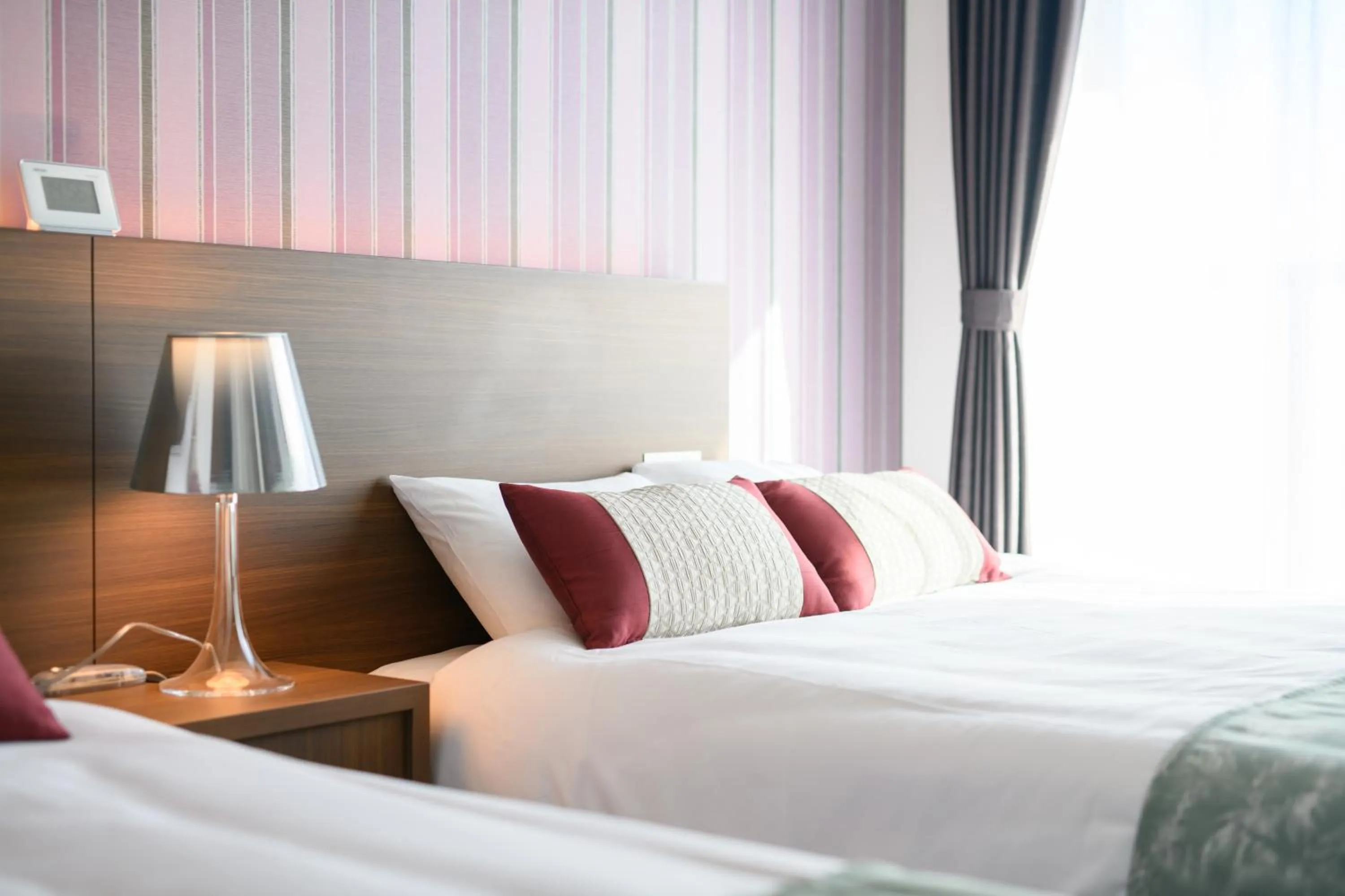 Bed in Oyado Shinmachi Gojo