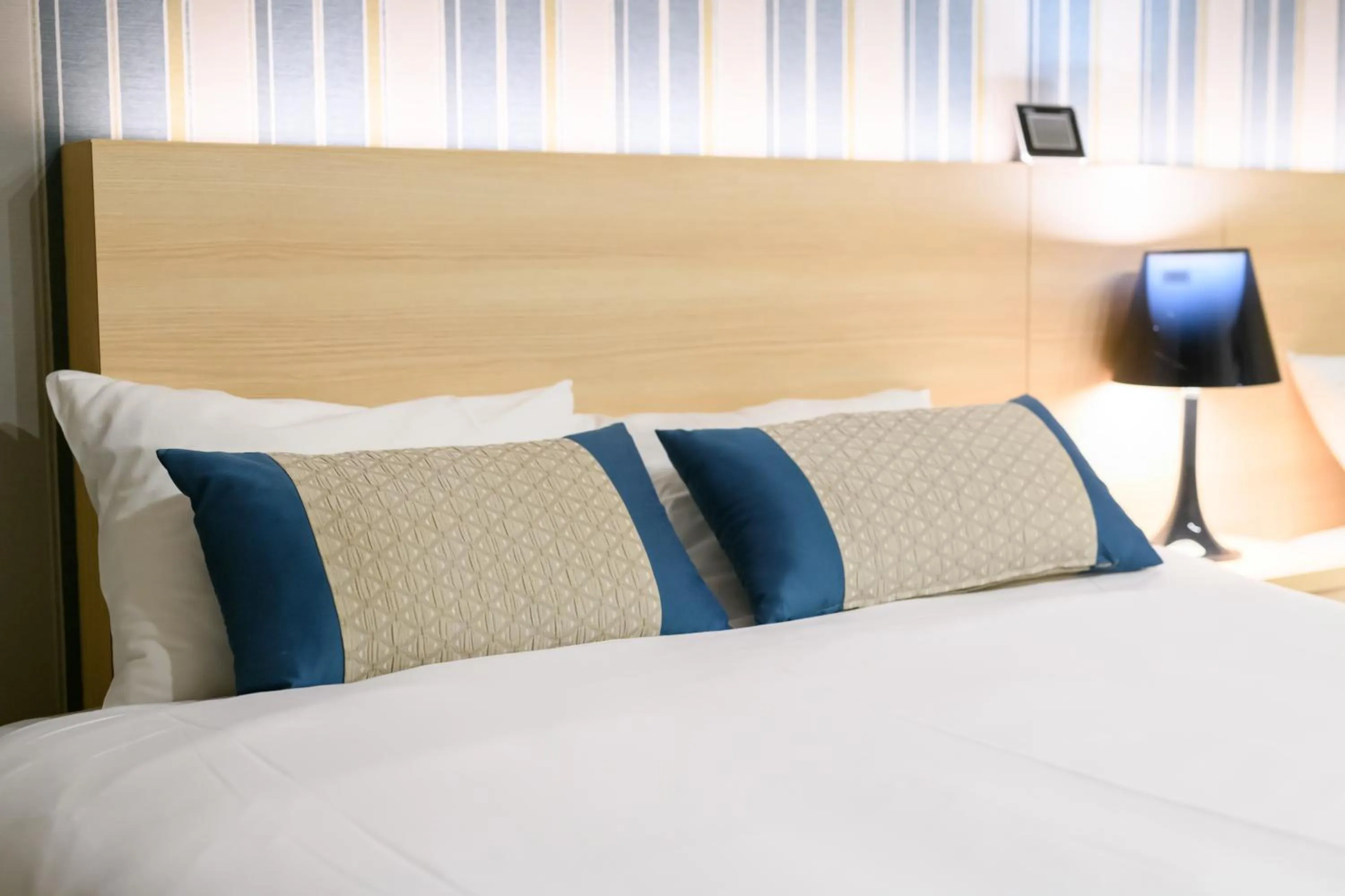 Bed in Oyado Shinmachi Gojo