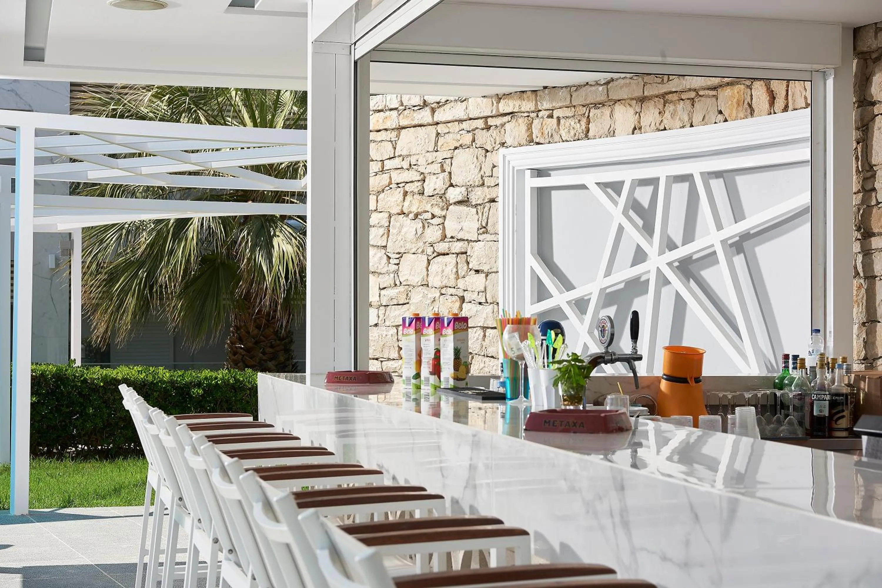 Lounge or bar in Mythos Palace Resort & Spa