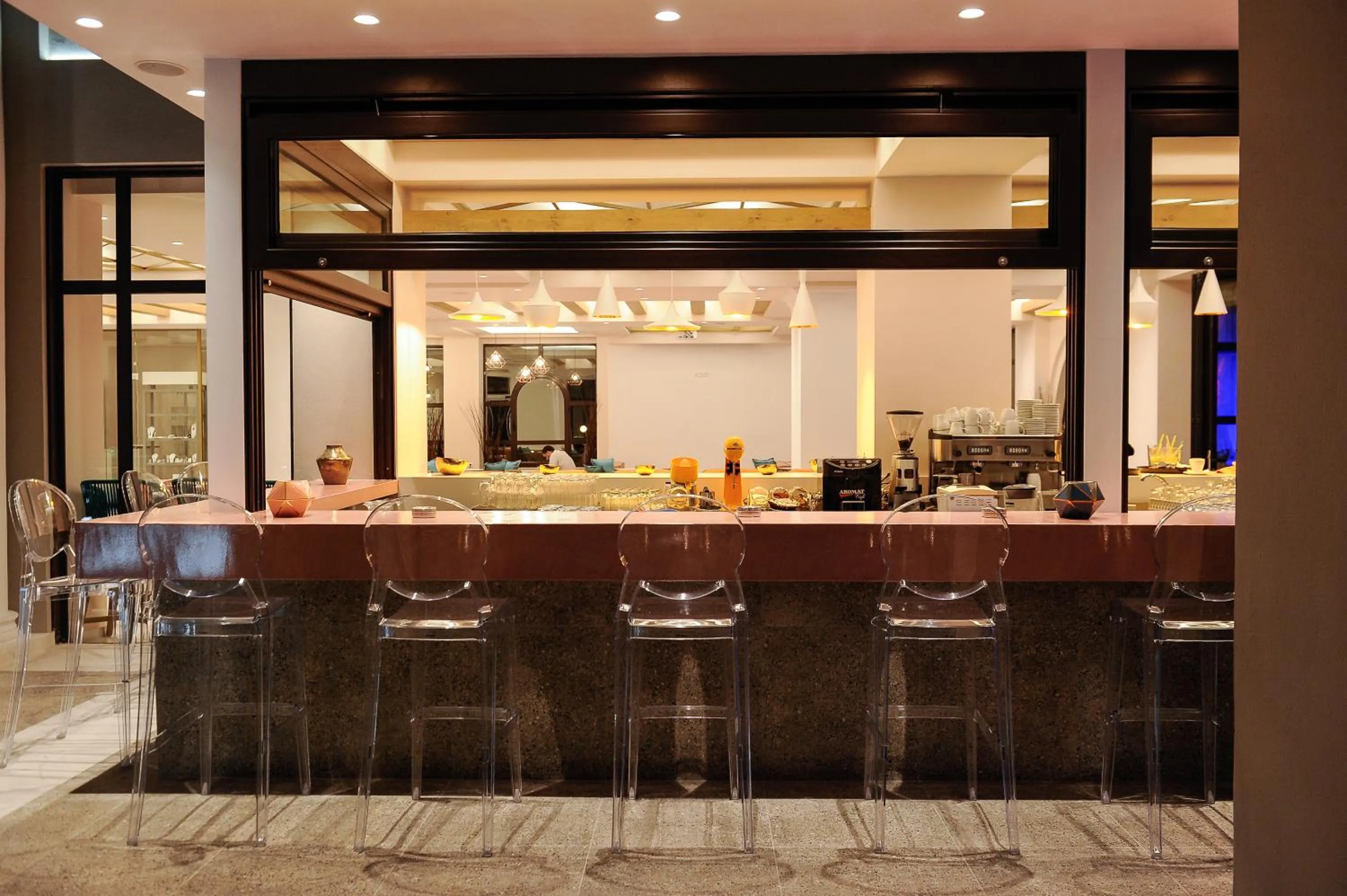 Lounge or bar in Mythos Palace Resort & Spa