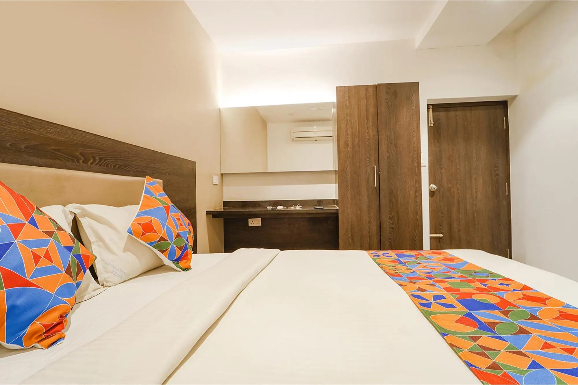 Bed in FabHotel Karpagam - 900m from Nehru Stadium