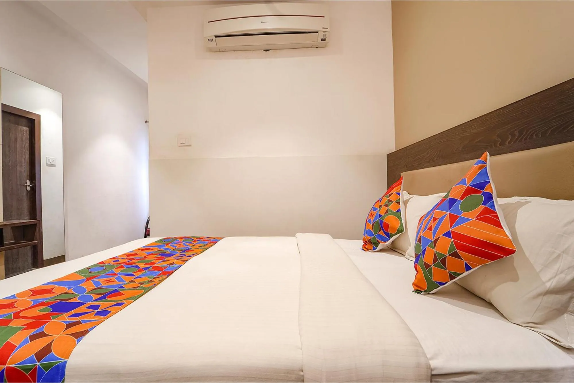 Bed in FabHotel Karpagam - 900m from Nehru Stadium