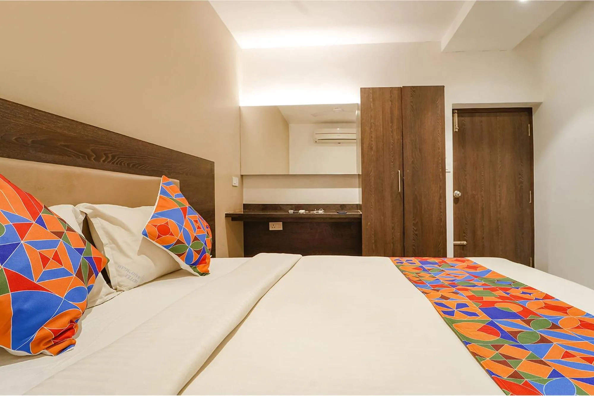 Bed in FabHotel Karpagam - 900m from Nehru Stadium