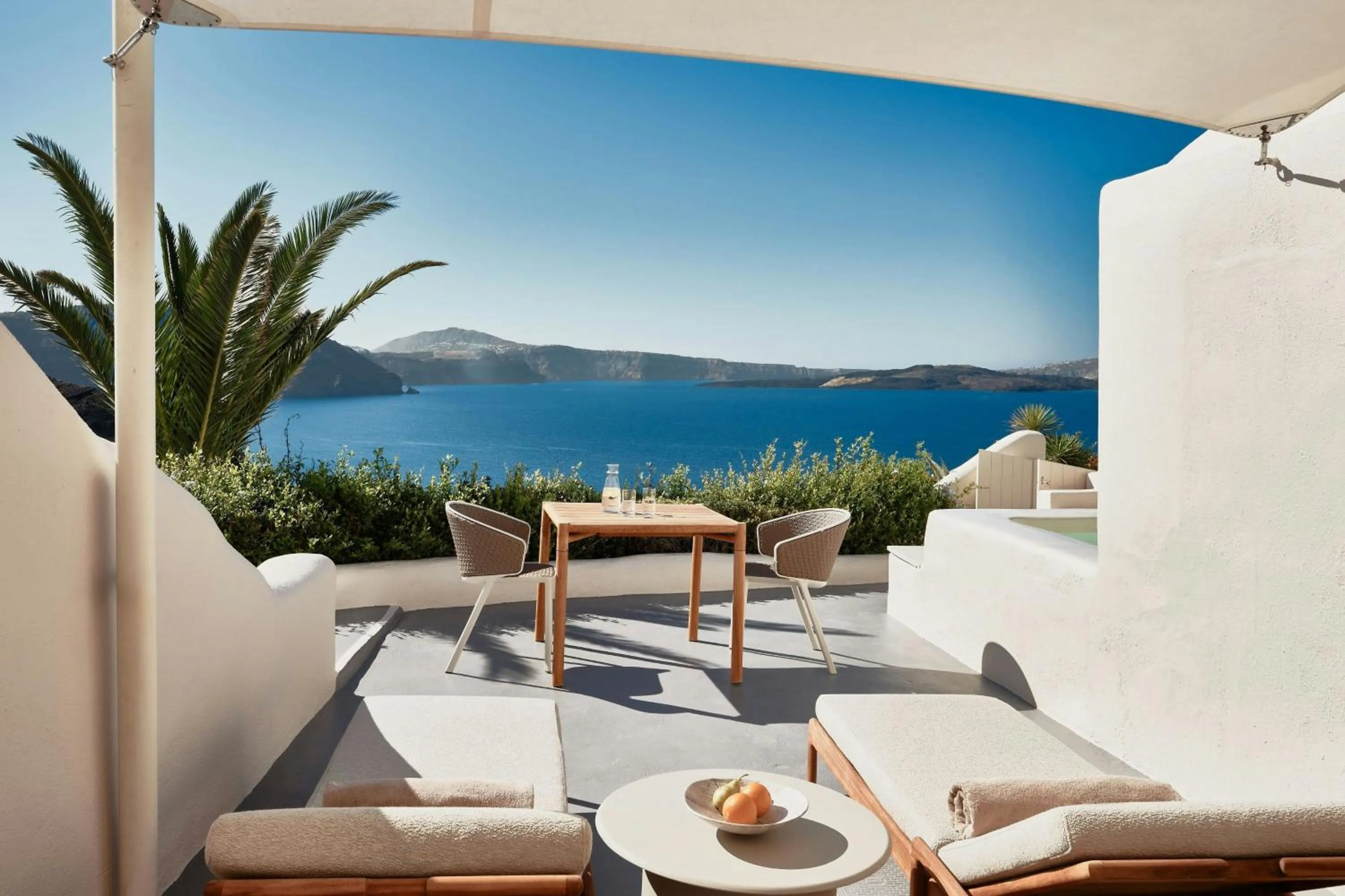 Photo of the whole room in Mystique, a Luxury Collection Hotel, Santorini