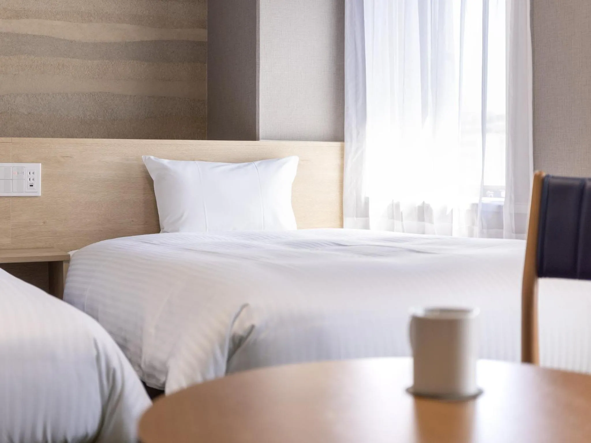 Photo of the whole room, Bed in KOKO HOTEL Shizuoka - formerly Hotel Wing International Shizuoka