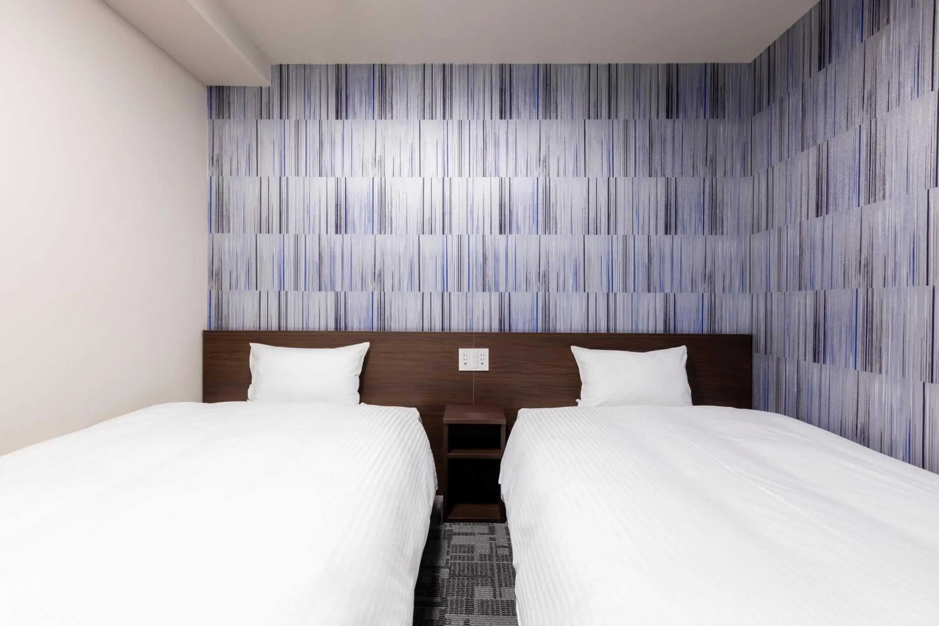 Bed in KOKO HOTEL Shizuoka - formerly Hotel Wing International Shizuoka Bed in KOKO HOTEL Shizuoka - formerly Hotel Wing International Shizuoka