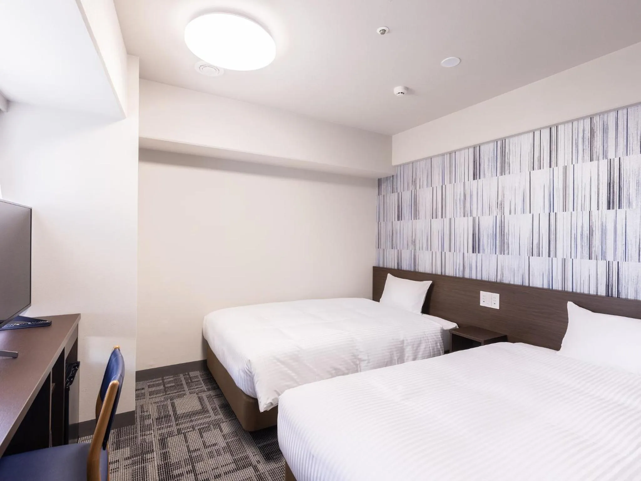 Photo of the whole room, Bed in KOKO HOTEL Shizuoka - formerly Hotel Wing International Shizuoka