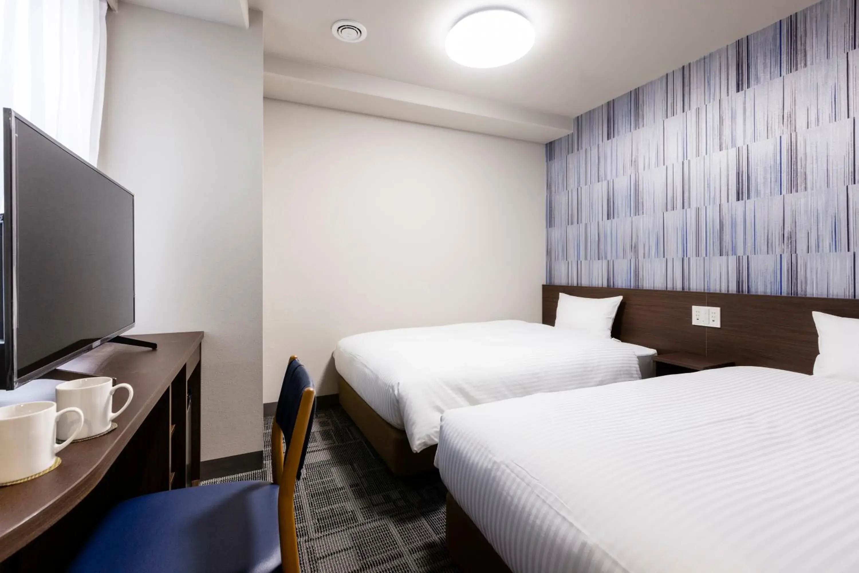 Photo of the whole room, Bed in KOKO HOTEL Shizuoka - formerly Hotel Wing International Shizuoka Photo of the whole room, Bed in KOKO HOTEL Shizuoka - formerly Hotel Wing International Shizuoka