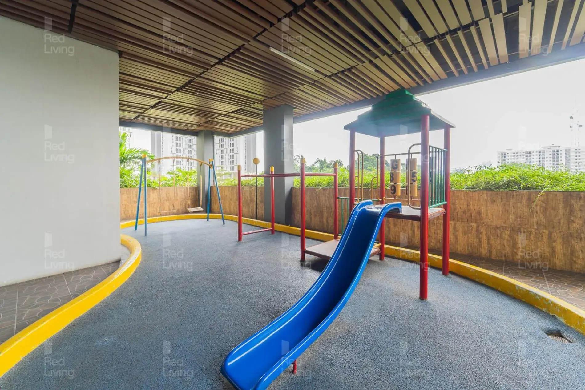 Children play ground in RedLiving Apartemen Serpong Green View - Nawawih Room Tower B Children play ground in RedLiving Apartemen Serpong Green View - Nawawih Room Tower B