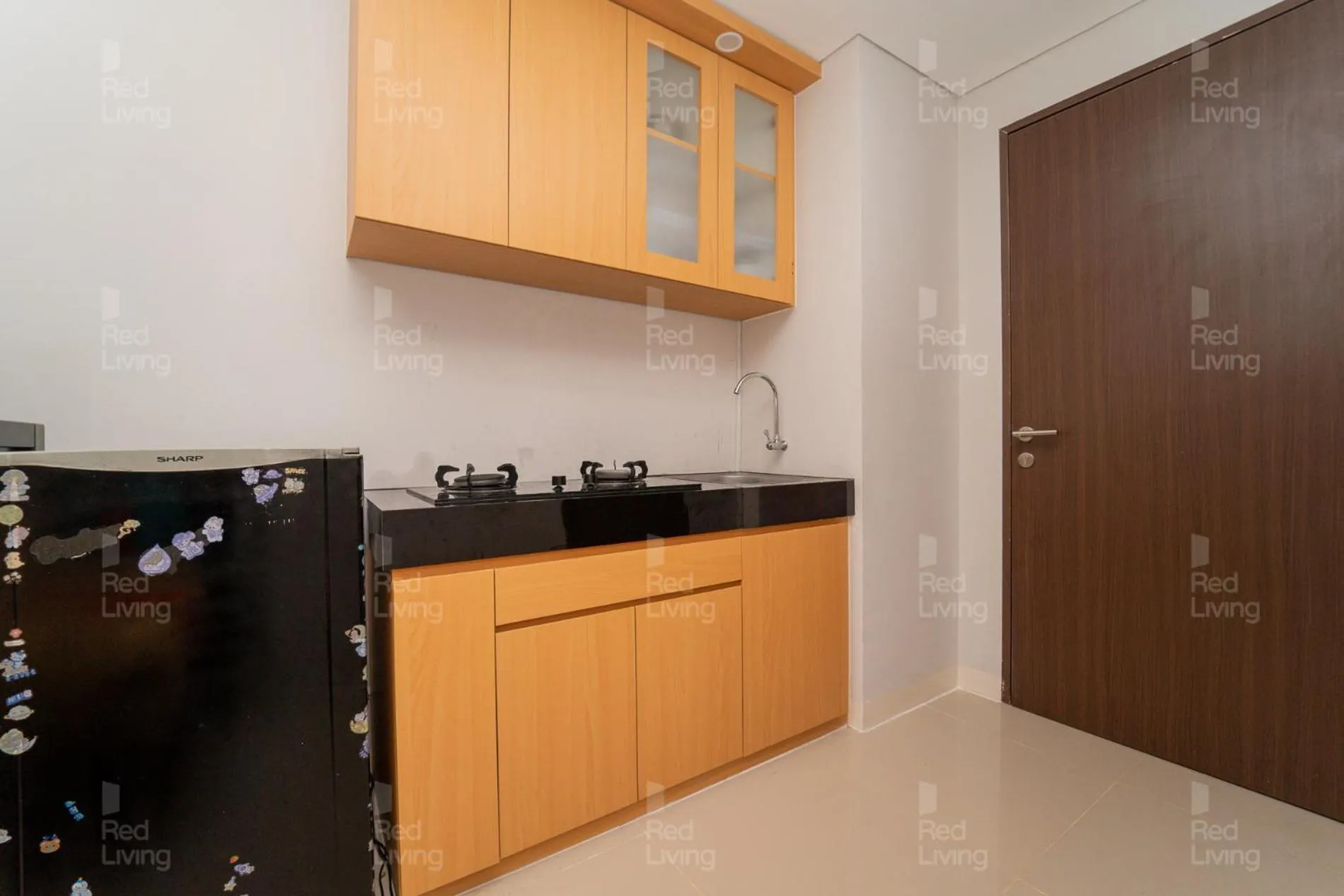 Kitchen or kitchenette in RedLiving Apartemen Transpark Juanda - F88 Tower Jade
