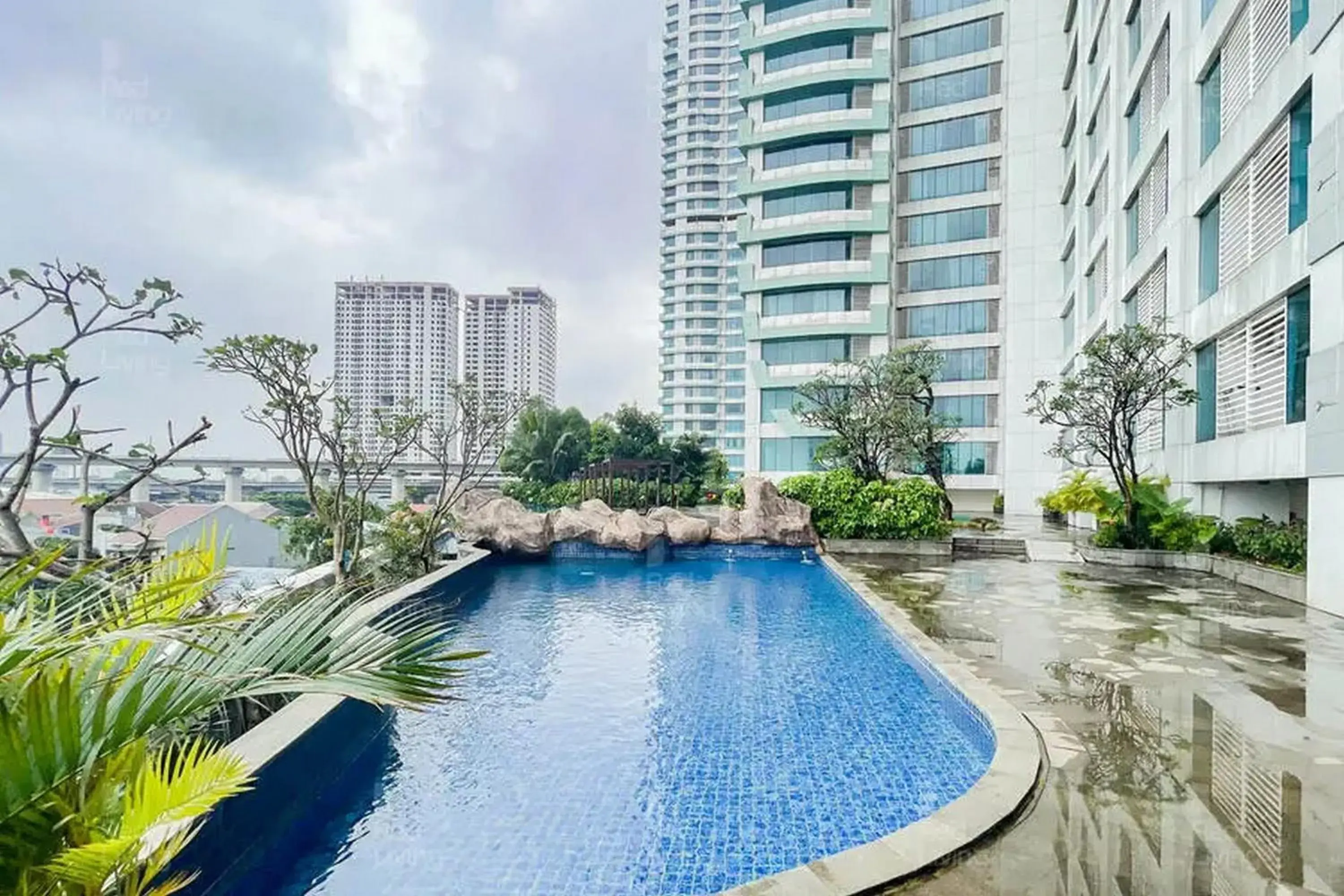 Property building in RedLiving Apartemen Grand Kamala Lagoon - Icha Rooms Tower Barclay South with Netflix Property building in RedLiving Apartemen Grand Kamala Lagoon - Icha Rooms Tower Barclay South with Netflix