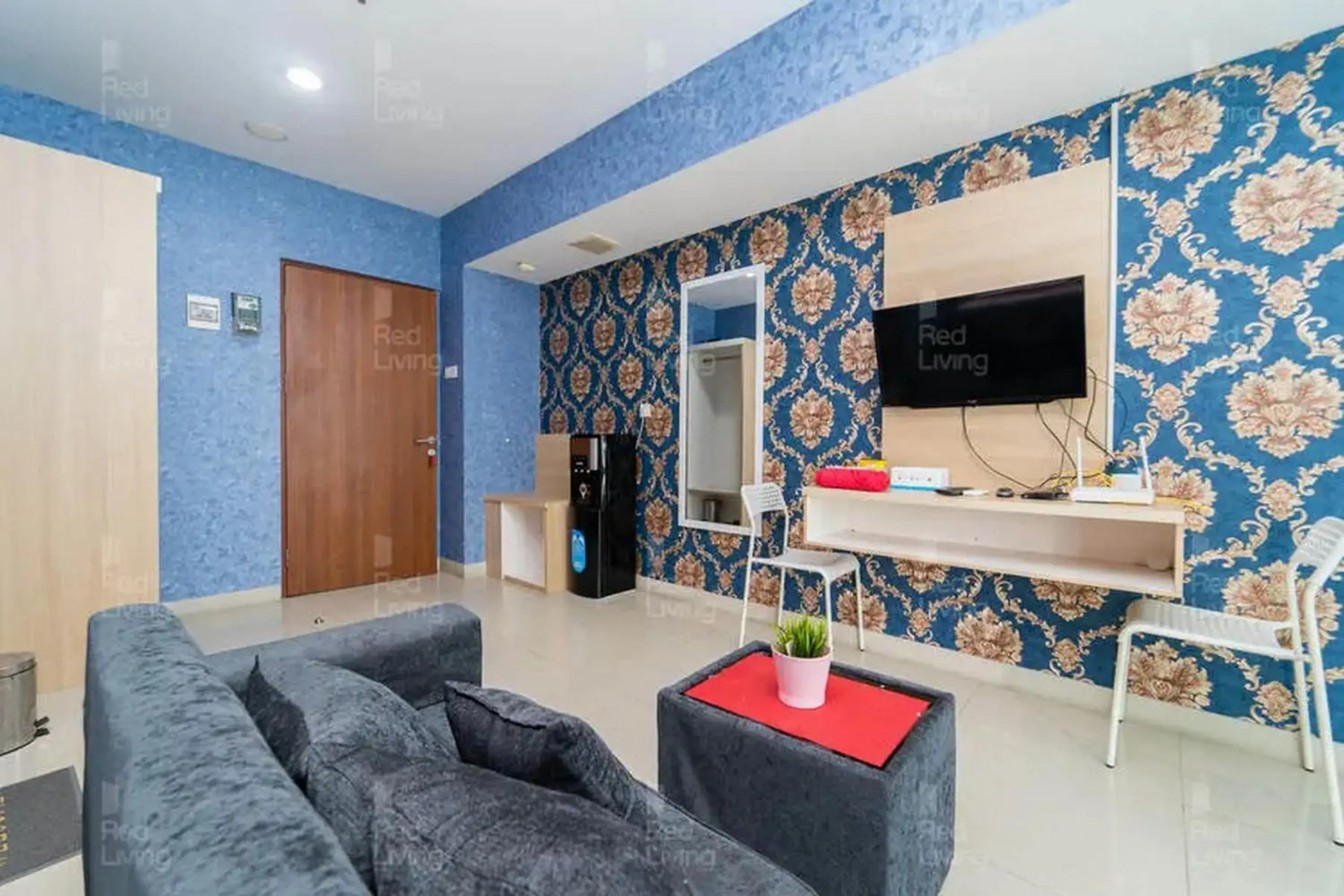 Living room in RedLiving Apartemen Grand Kamala Lagoon - Icha Rooms Tower Barclay South with Netflix Living room in RedLiving Apartemen Grand Kamala Lagoon - Icha Rooms Tower Barclay South with Netflix