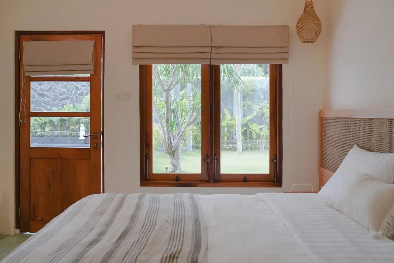 Bedroom, Bed in Roots Hotel Senggigi Bedroom, Bed in Roots Hotel Senggigi