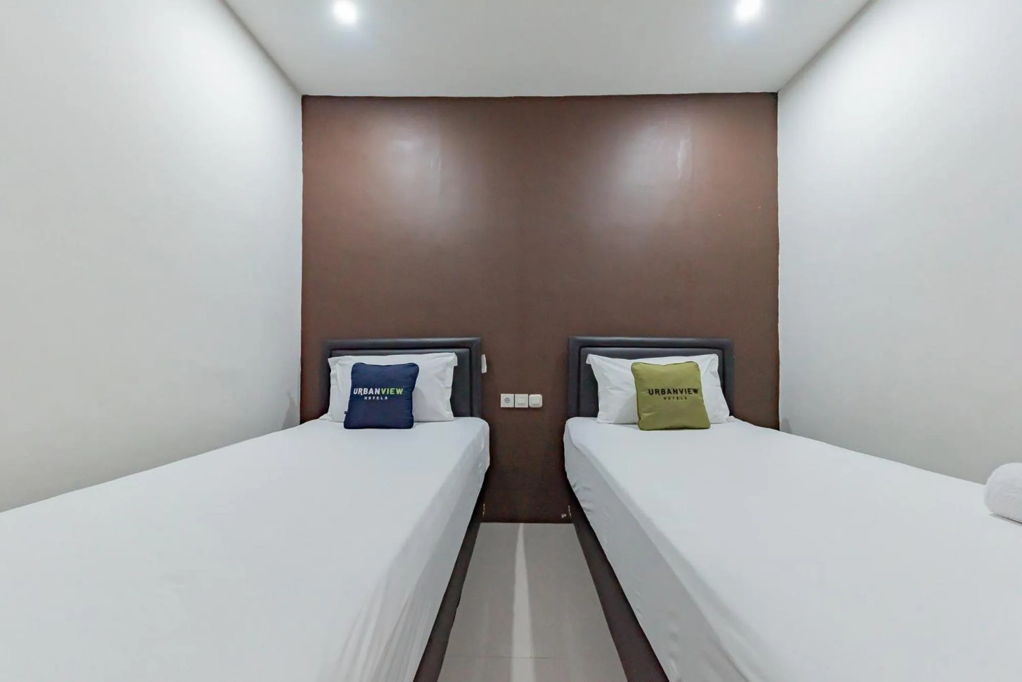 Bed in Urbanview Hotel Yoga Palangkaraya by RedDoorz