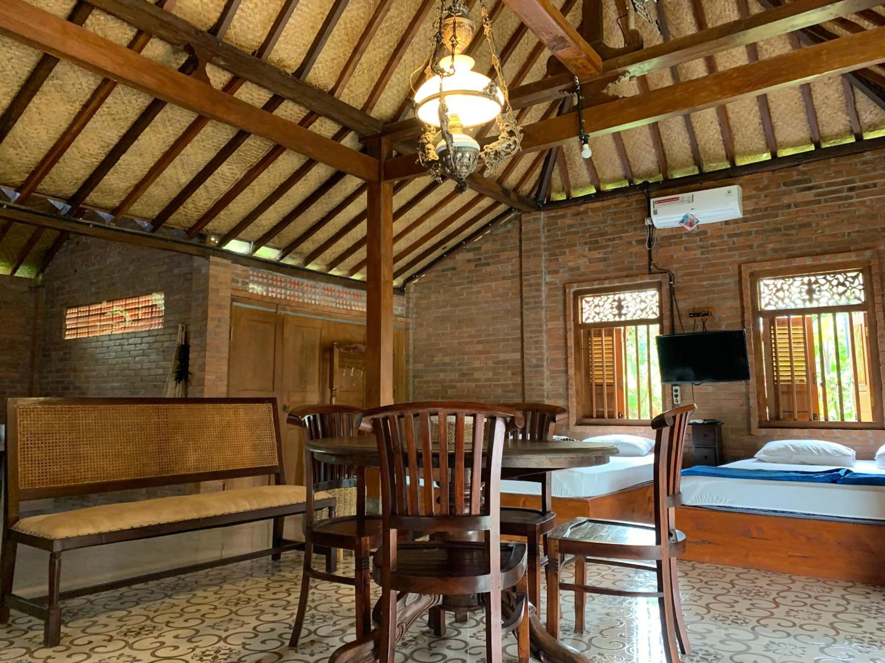 Bedroom in Omah Mbah Mandor by The Lavana