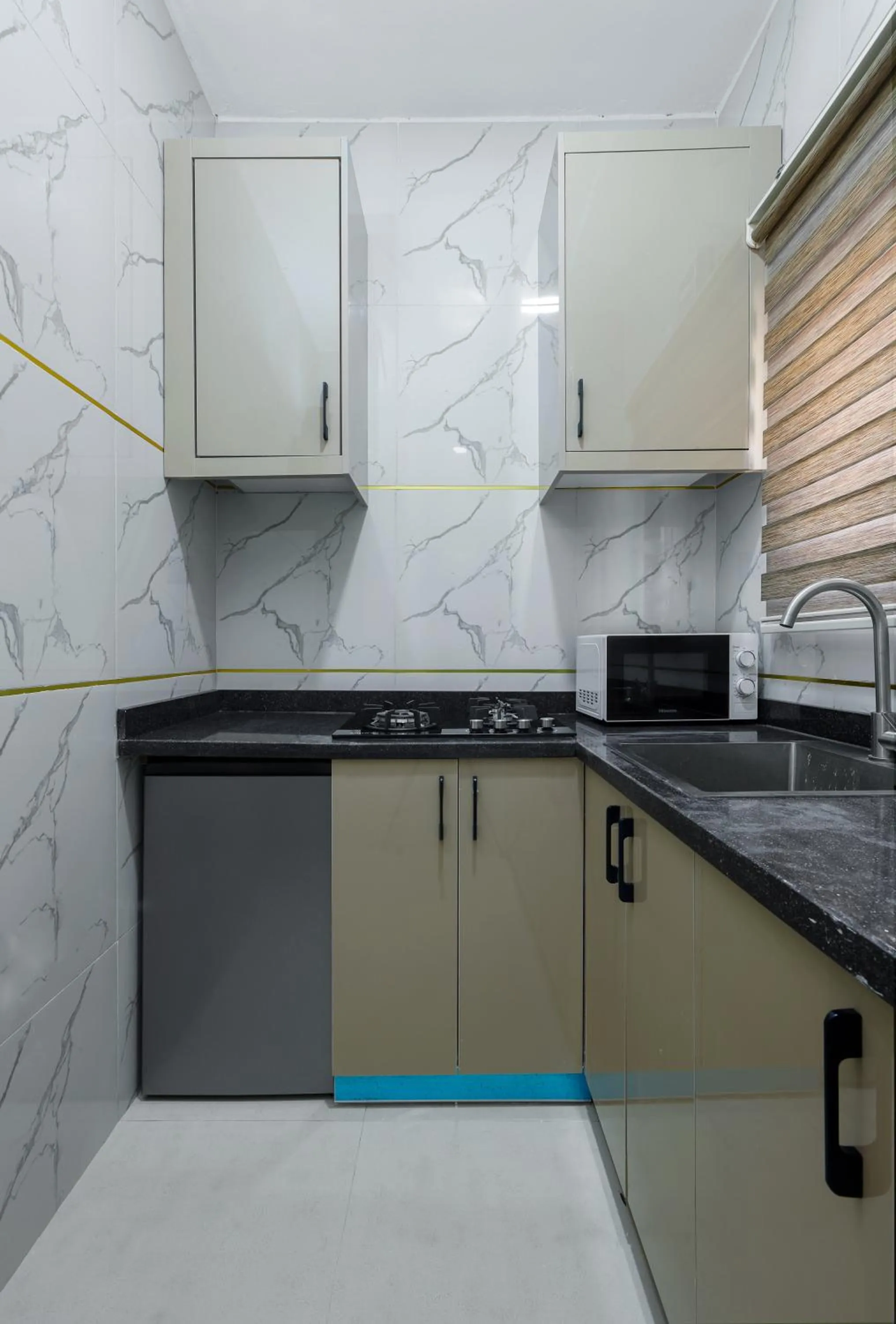 Kitchen or kitchenette in BKT Cribs - Apartments & Suites