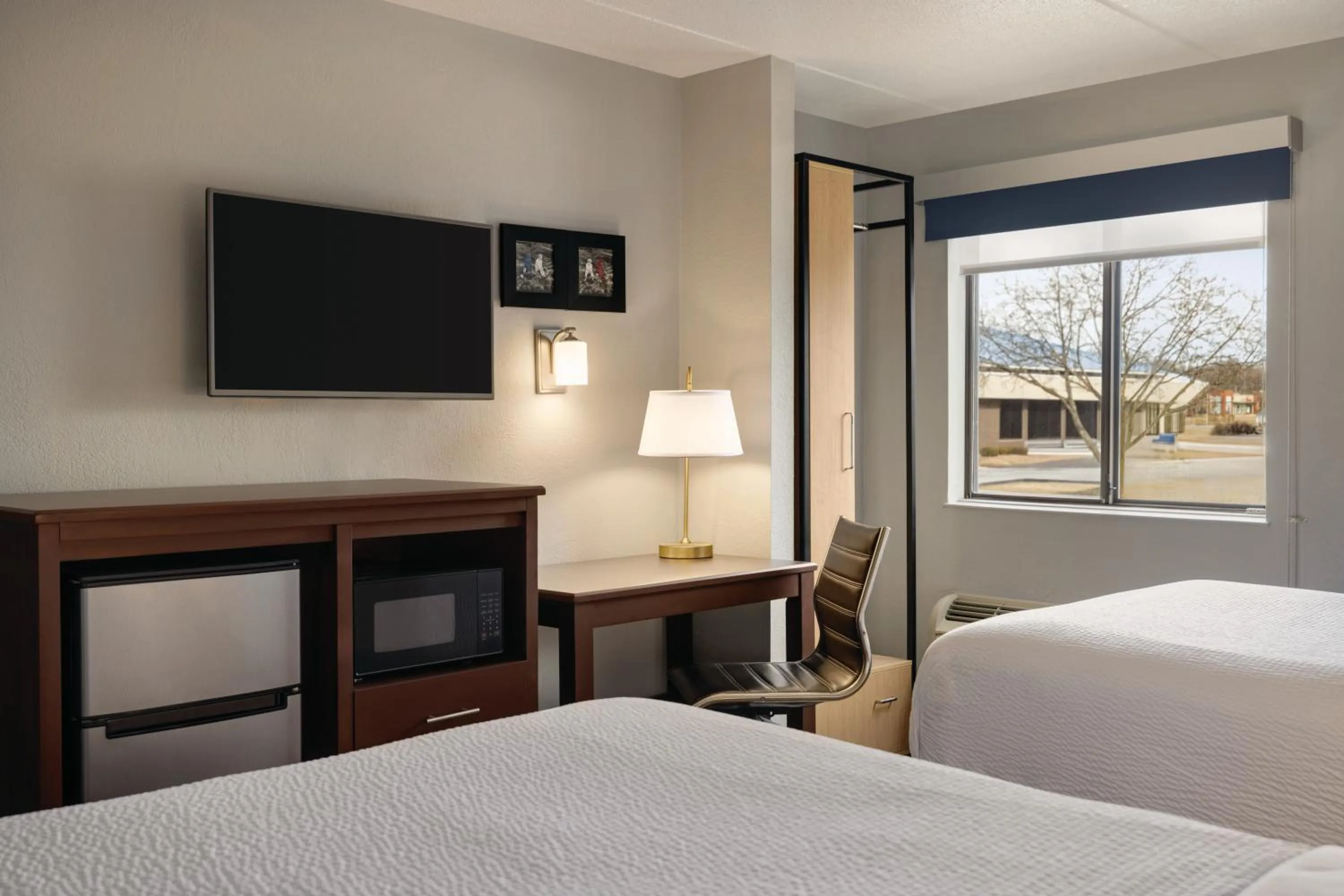 TV and multimedia, Bed in AmericInn by Wyndham Madison WI