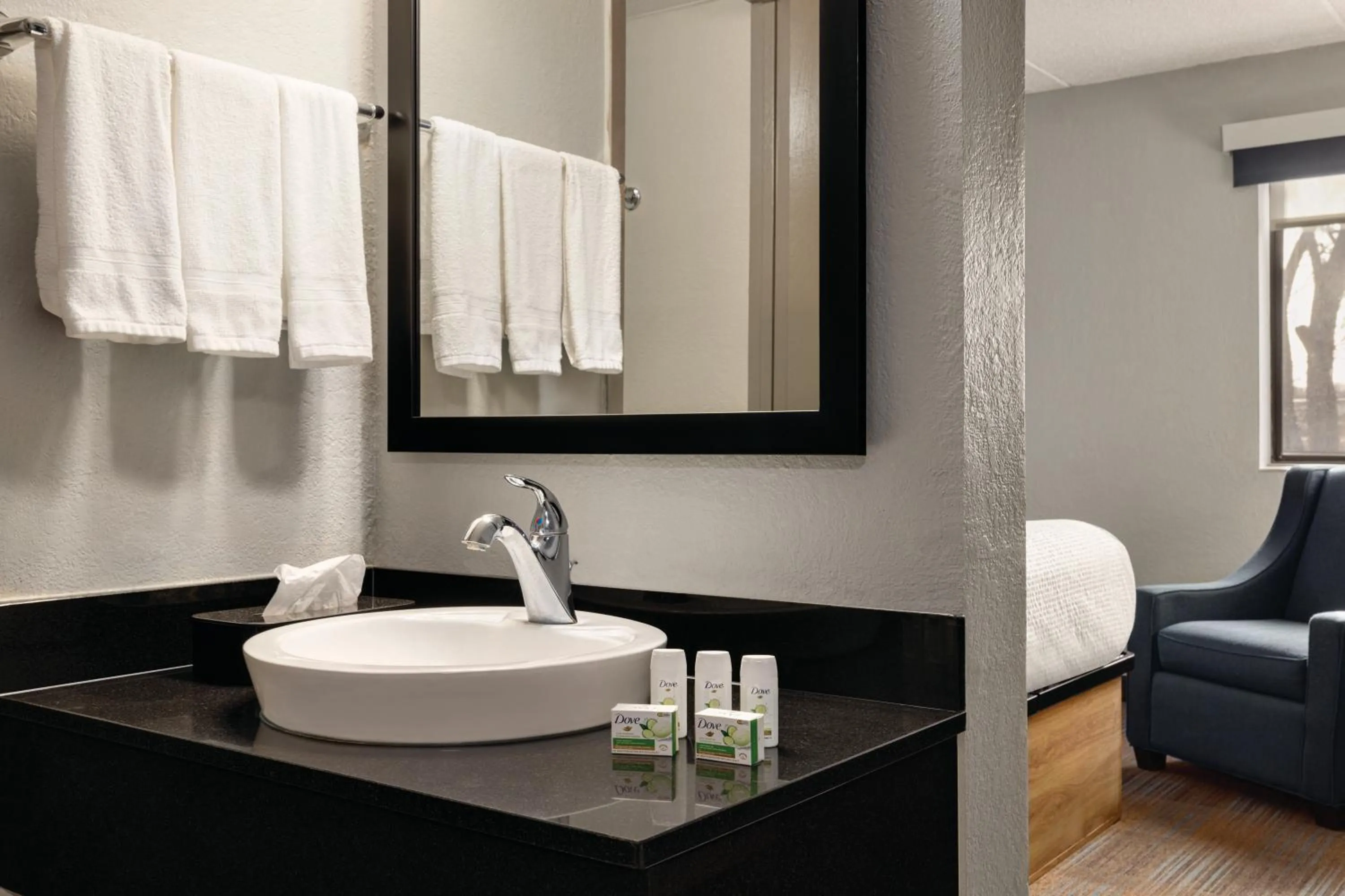 Bathroom in AmericInn by Wyndham Madison WI