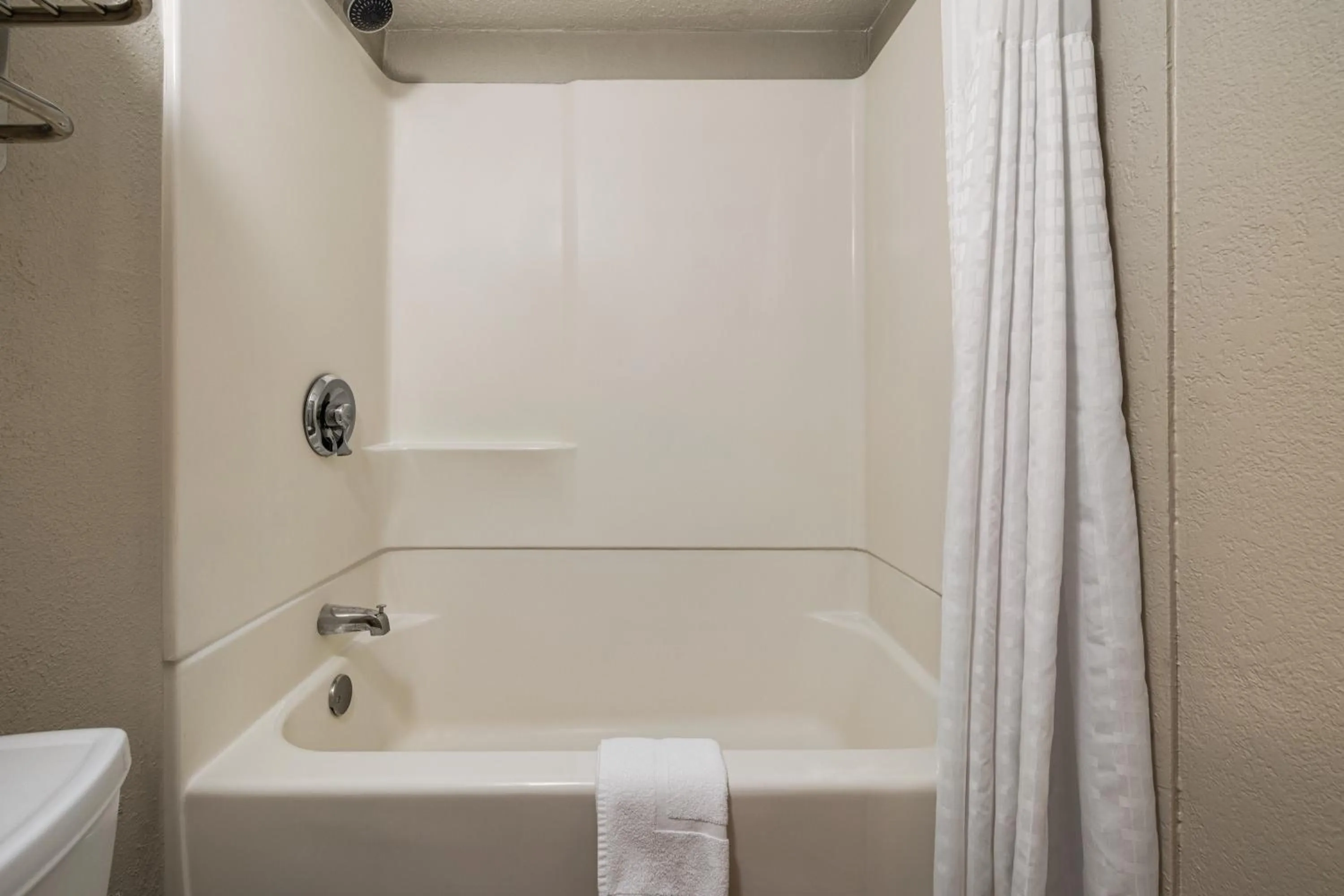 Bathroom in AmericInn by Wyndham Madison WI