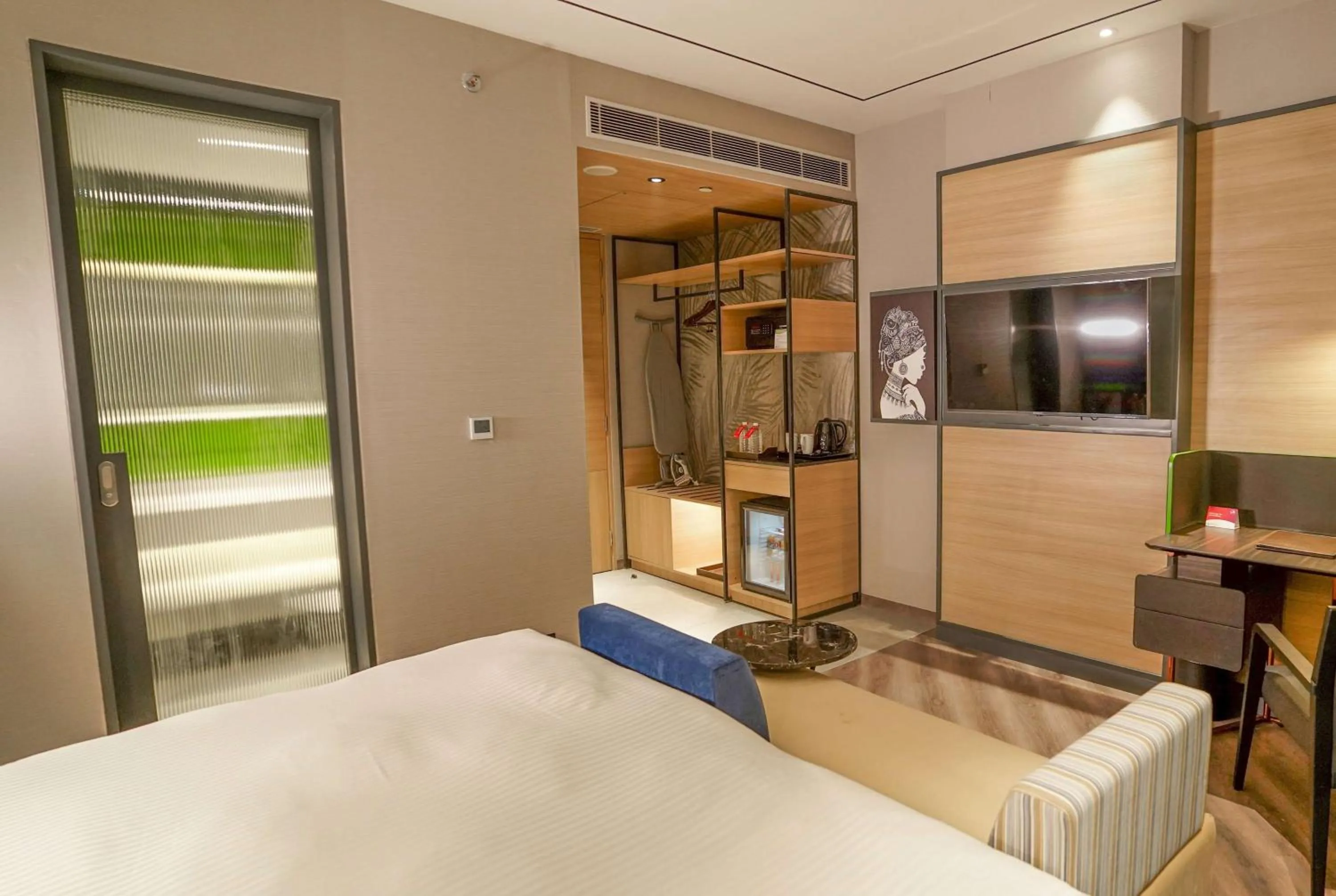 Photo of the whole room, Bed in Ramada Encore by Wyndham Bareilly Civil Lines