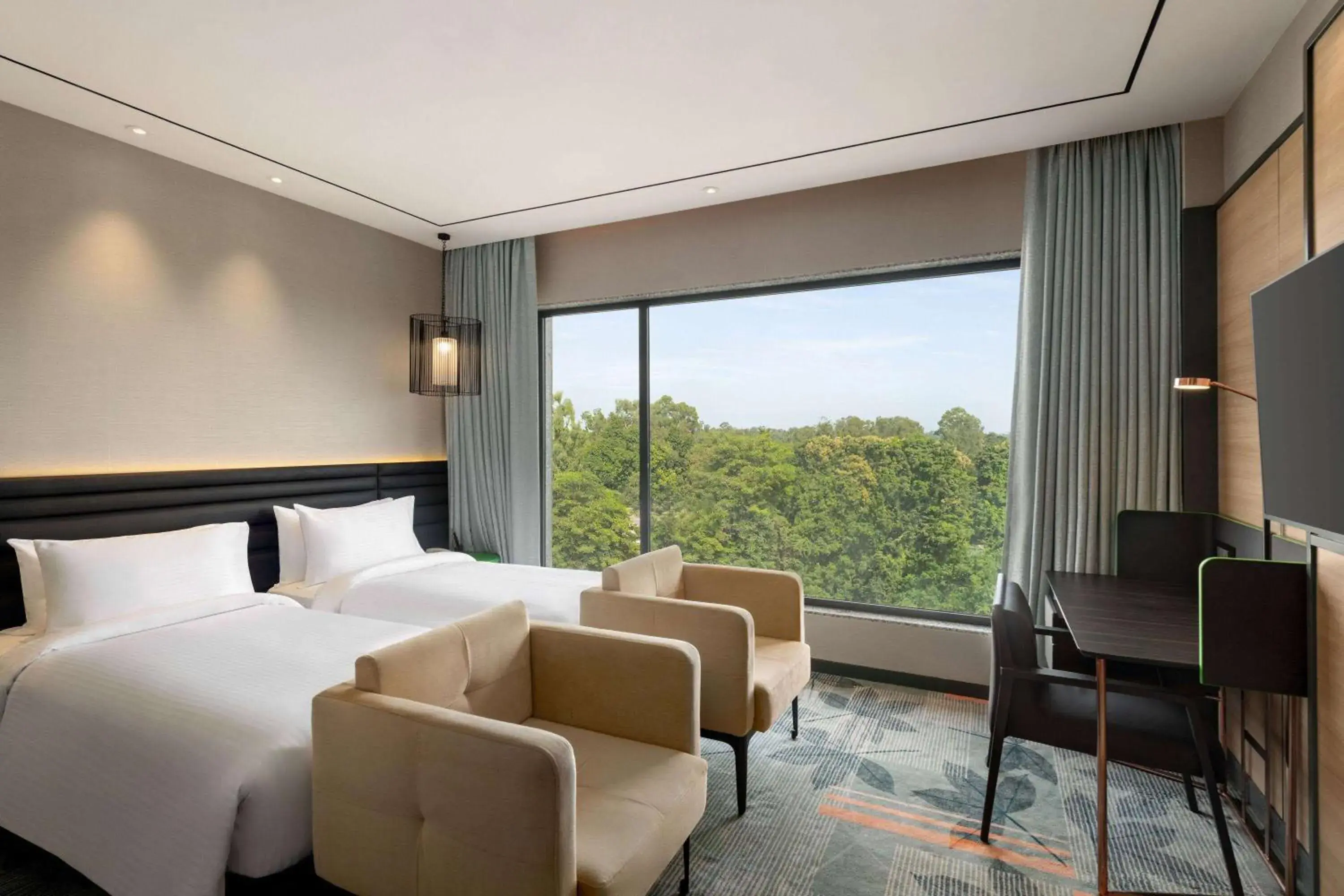 Photo of the whole room, Bed in Ramada Encore by Wyndham Bareilly Civil Lines Photo of the whole room, Bed in Ramada Encore by Wyndham Bareilly Civil Lines